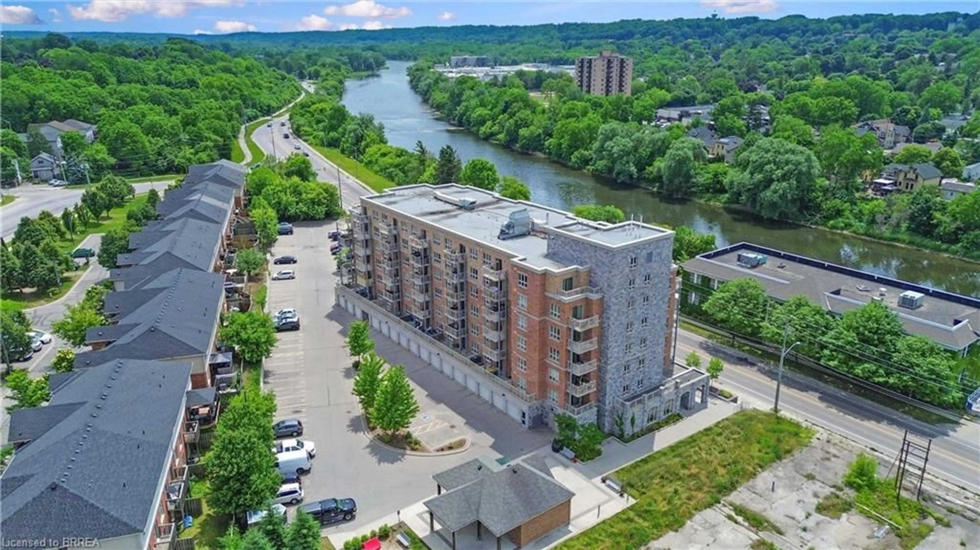 A pic from outside/outdoor area/front of a property/back of a property/a pic from drone, unknown for 155 Water St #505, Cambridge Ontario N1P 0A7