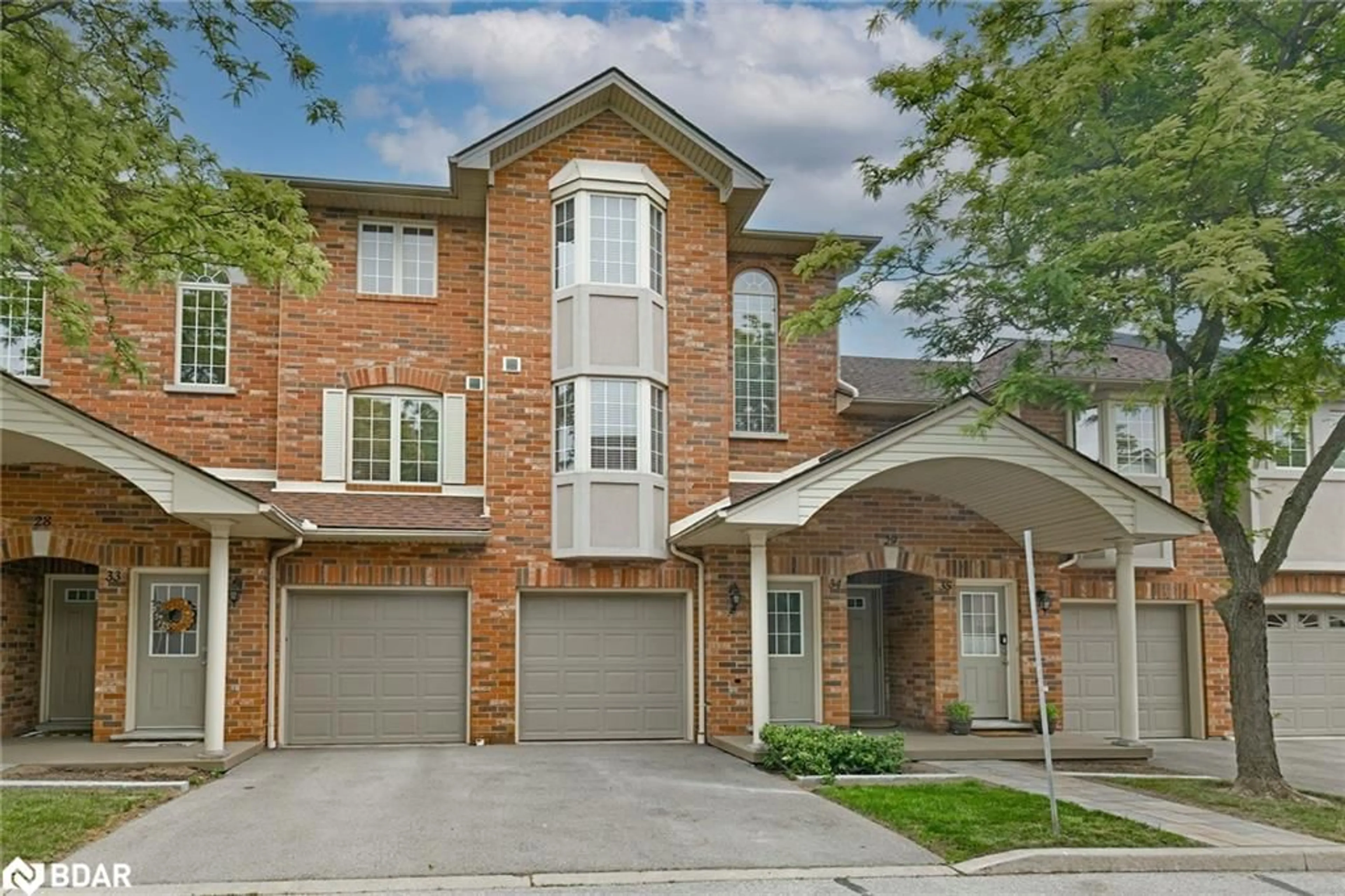 Home with brick exterior material, street for 4045 Upper Middle Rd #34, Burlington Ontario L7M 4S9