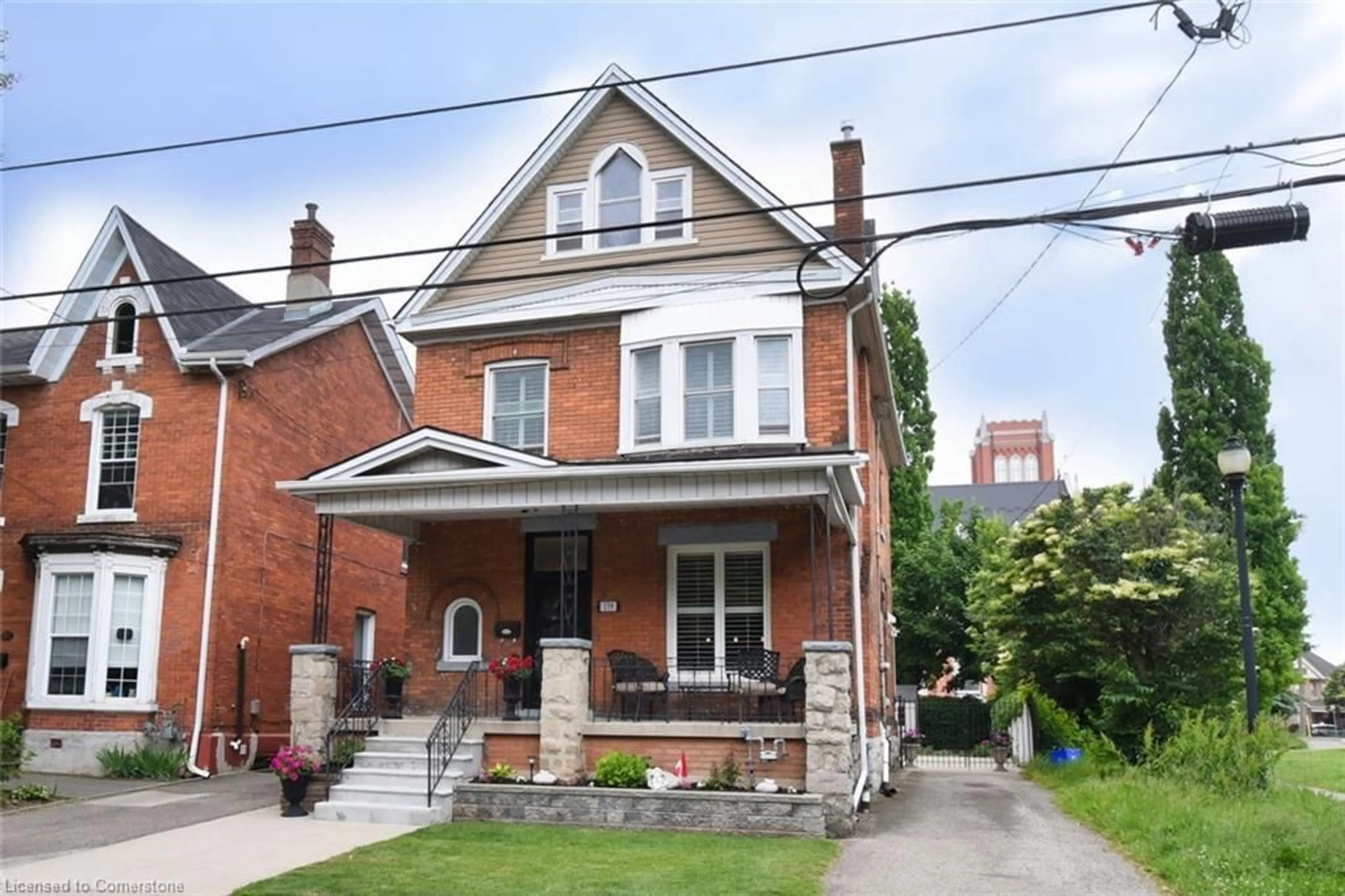Home with brick exterior material, street for 179 Macnab St, Hamilton Ontario L8R 2M5