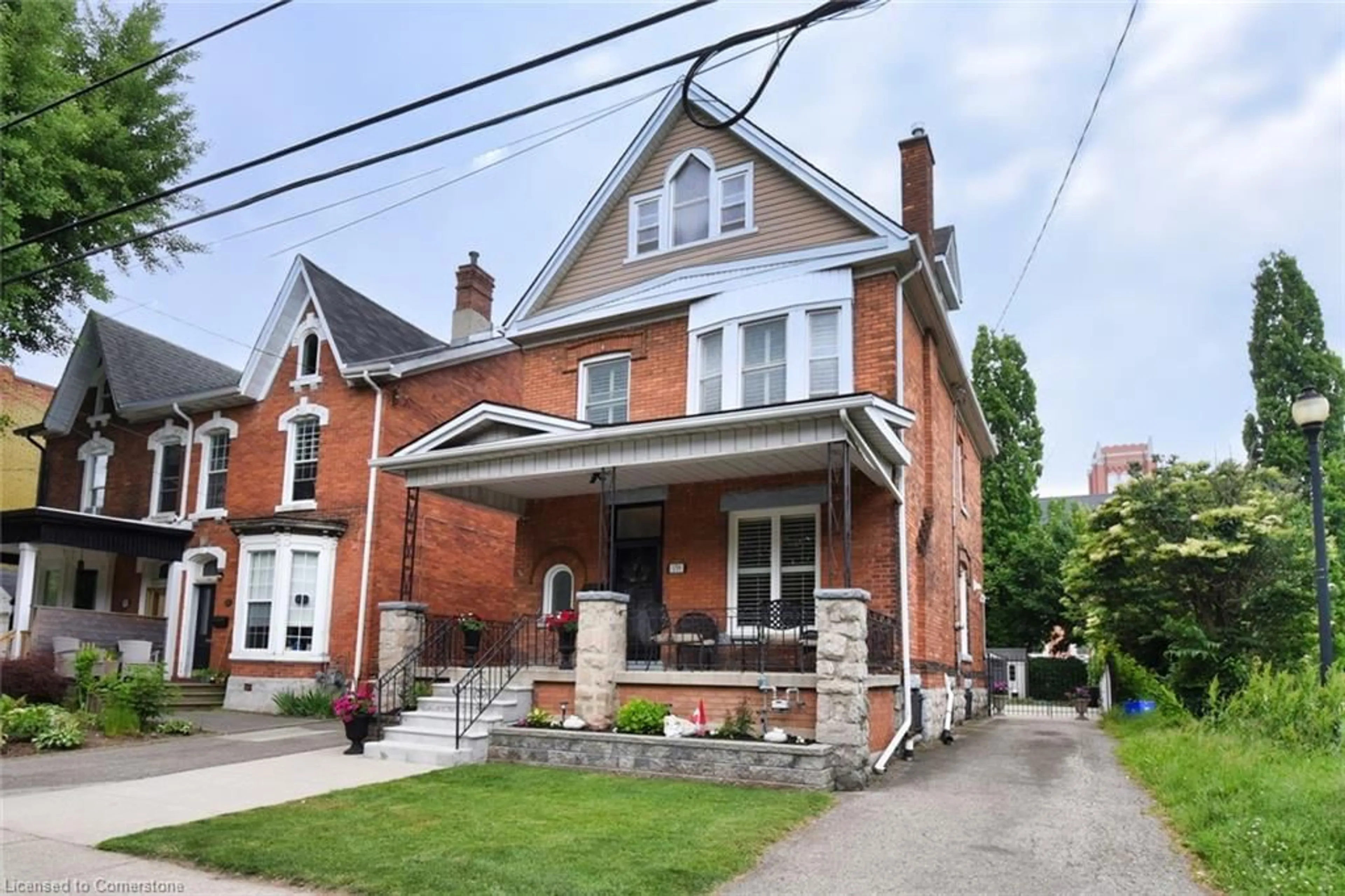 Home with brick exterior material, street for 179 Macnab St, Hamilton Ontario L8R 2M5