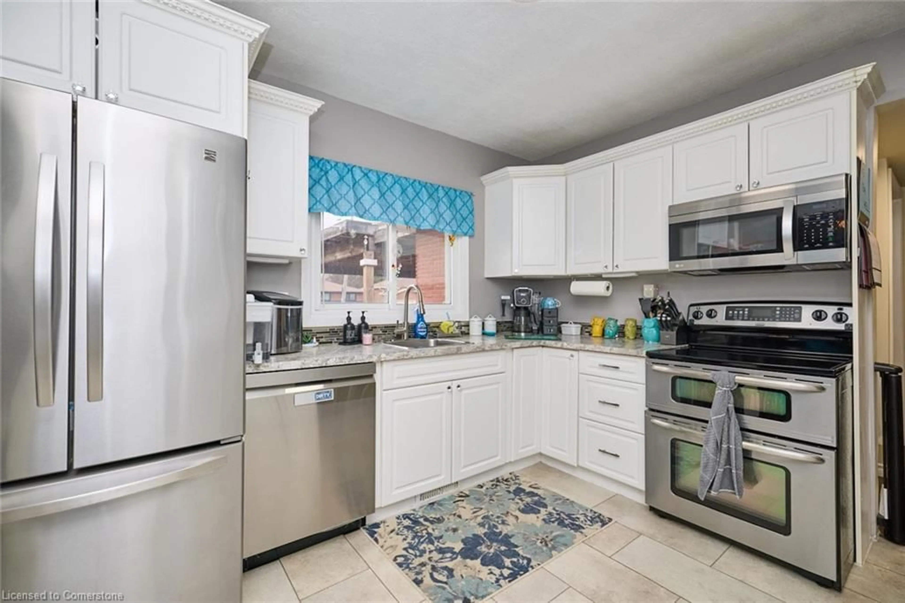 Standard kitchen, ceramic/tile floor for 42 Louth St, St. Catharines Ontario L2S 2T4