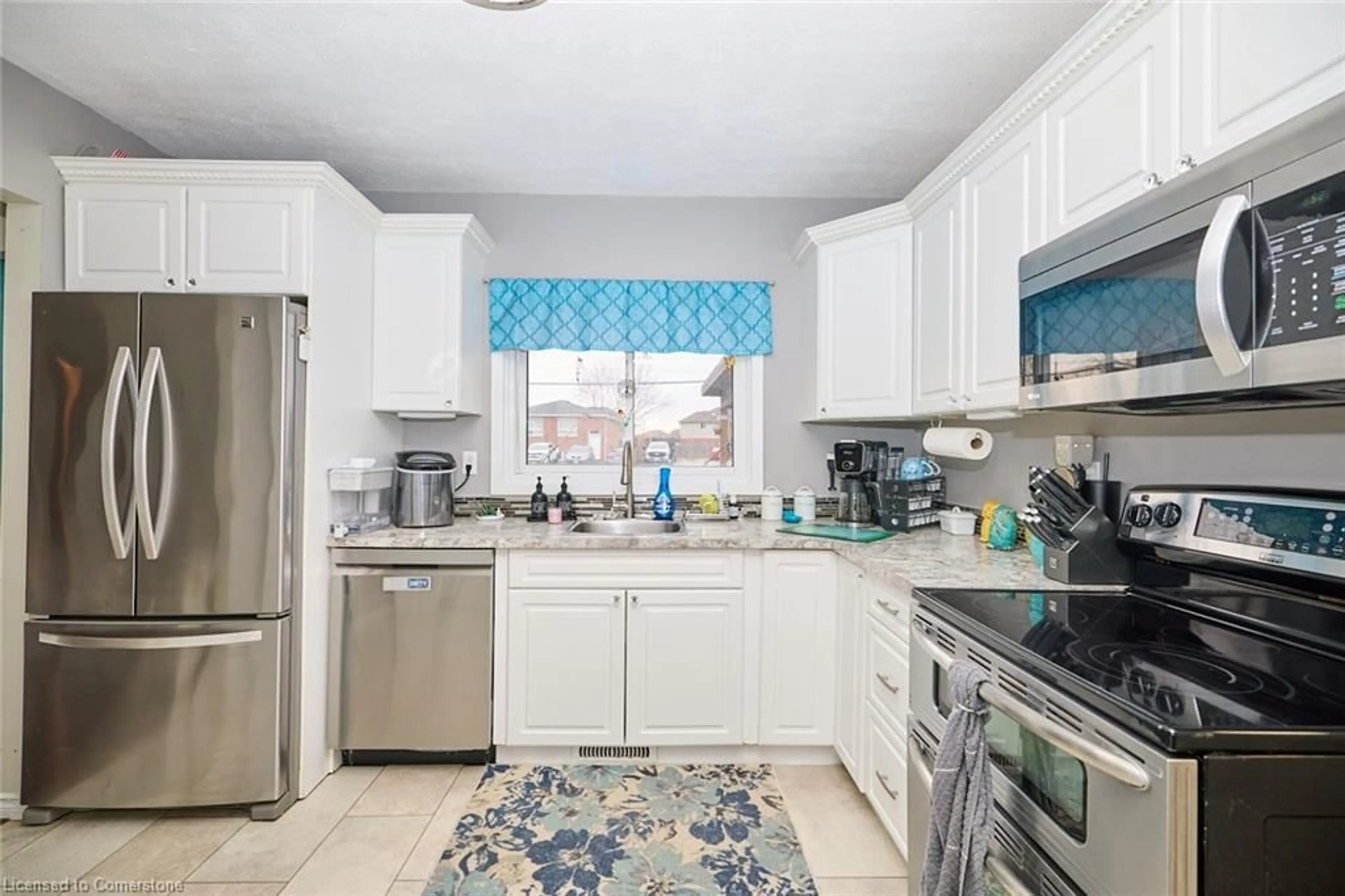 Standard kitchen, ceramic/tile floor for 42 Louth St, St. Catharines Ontario L2S 2T4