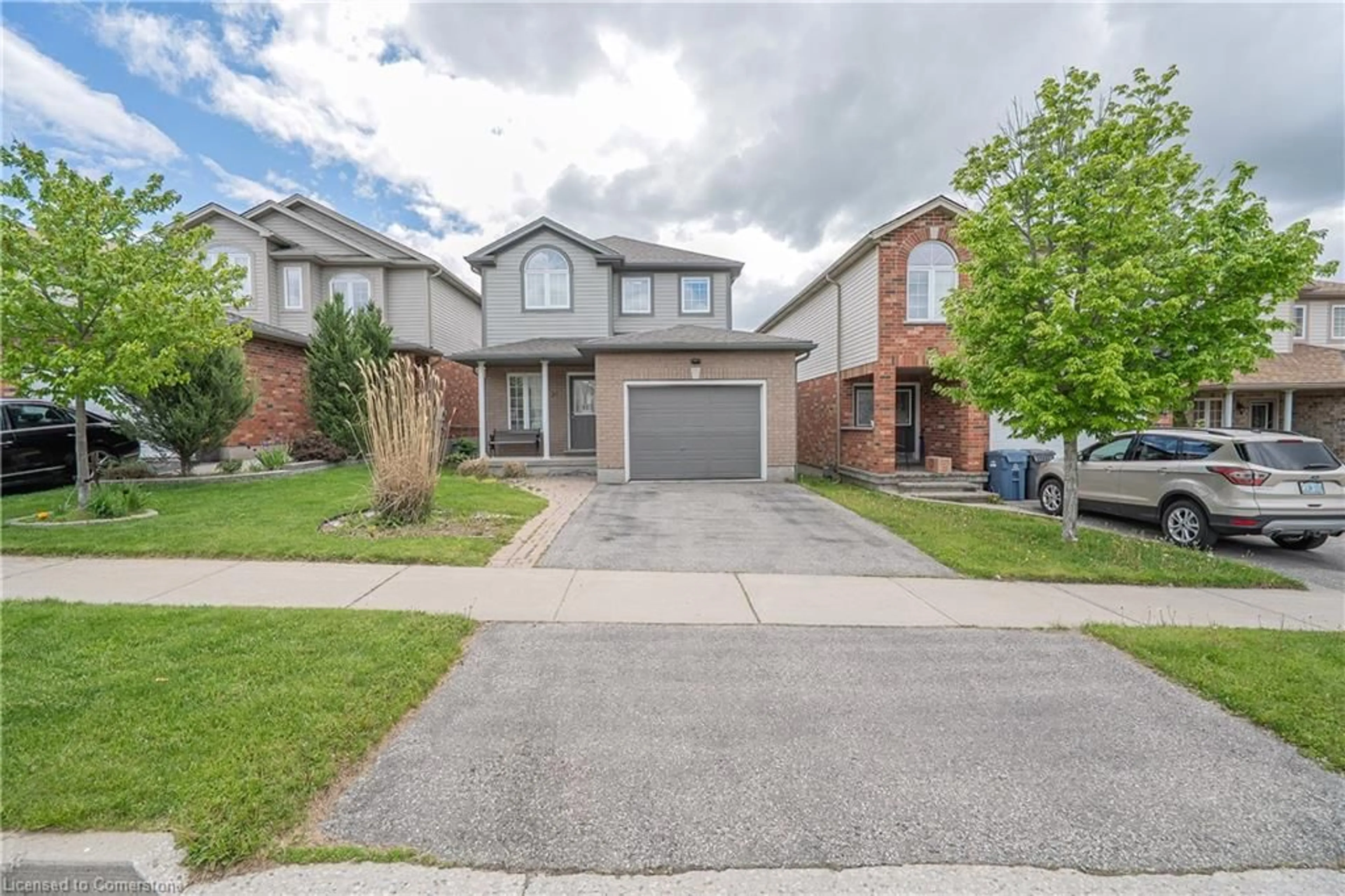 Home with brick exterior material, street for 21 Henderson Dr, Guelph Ontario N1E 0A1