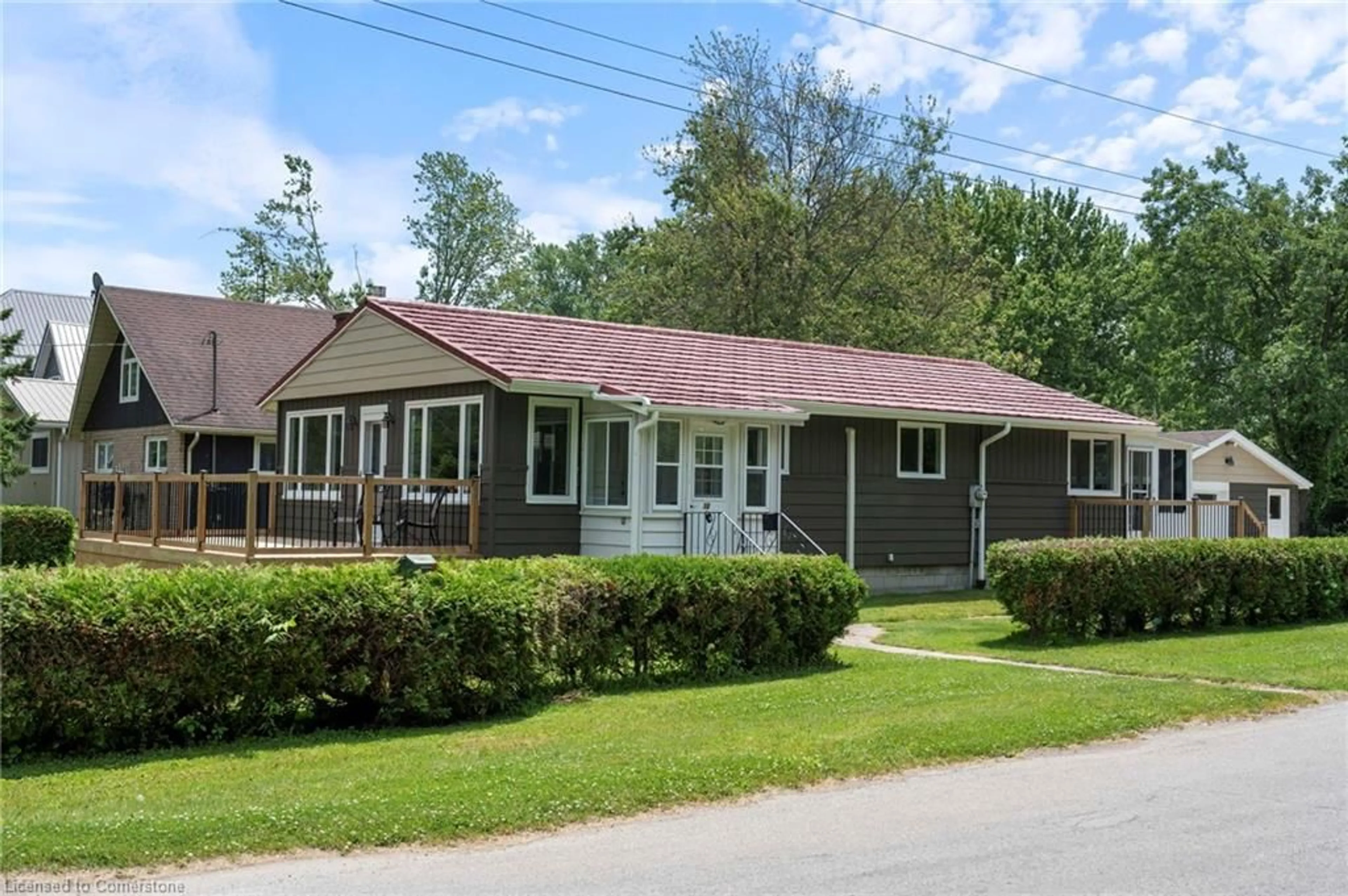 Home with vinyl exterior material, street for 10 Clubhouse Rd, Turkey Point Ontario N0E 1T0