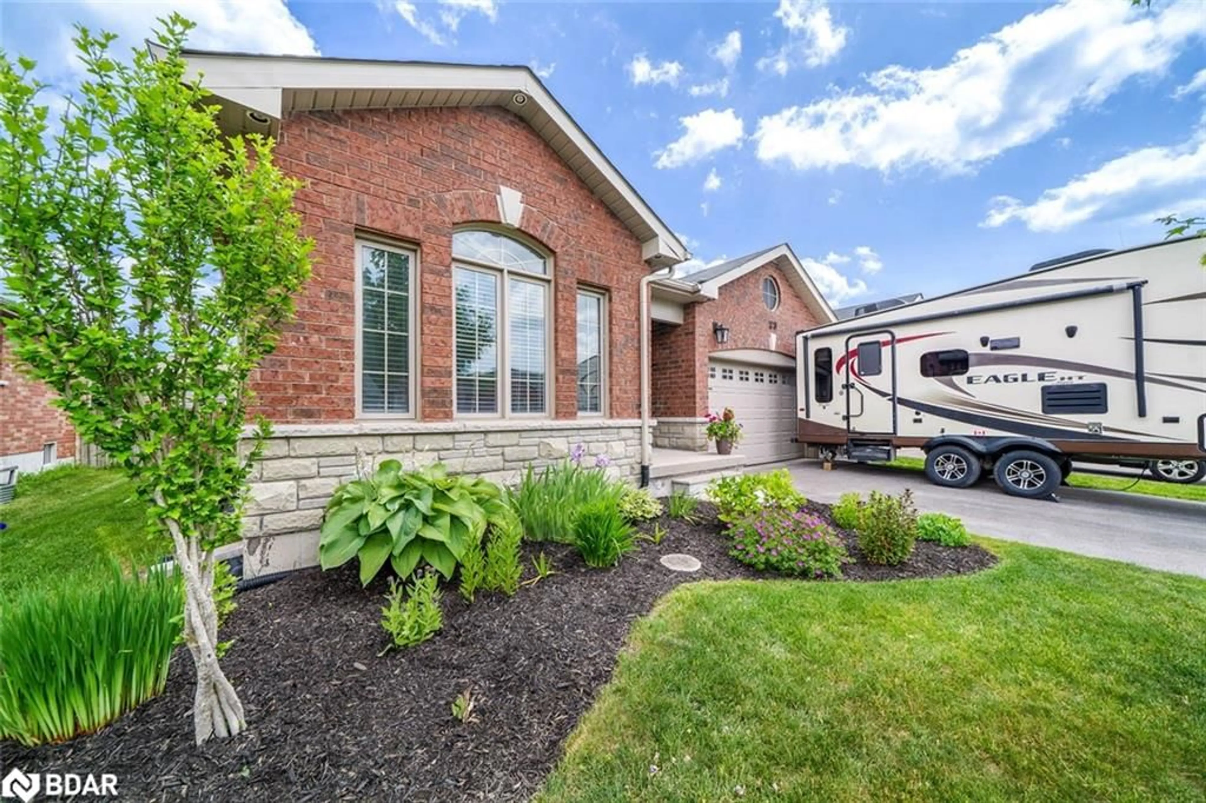 Home with brick exterior material, street for 23 Hatton Drive, Penetanguishene Ontario L9M 0V7