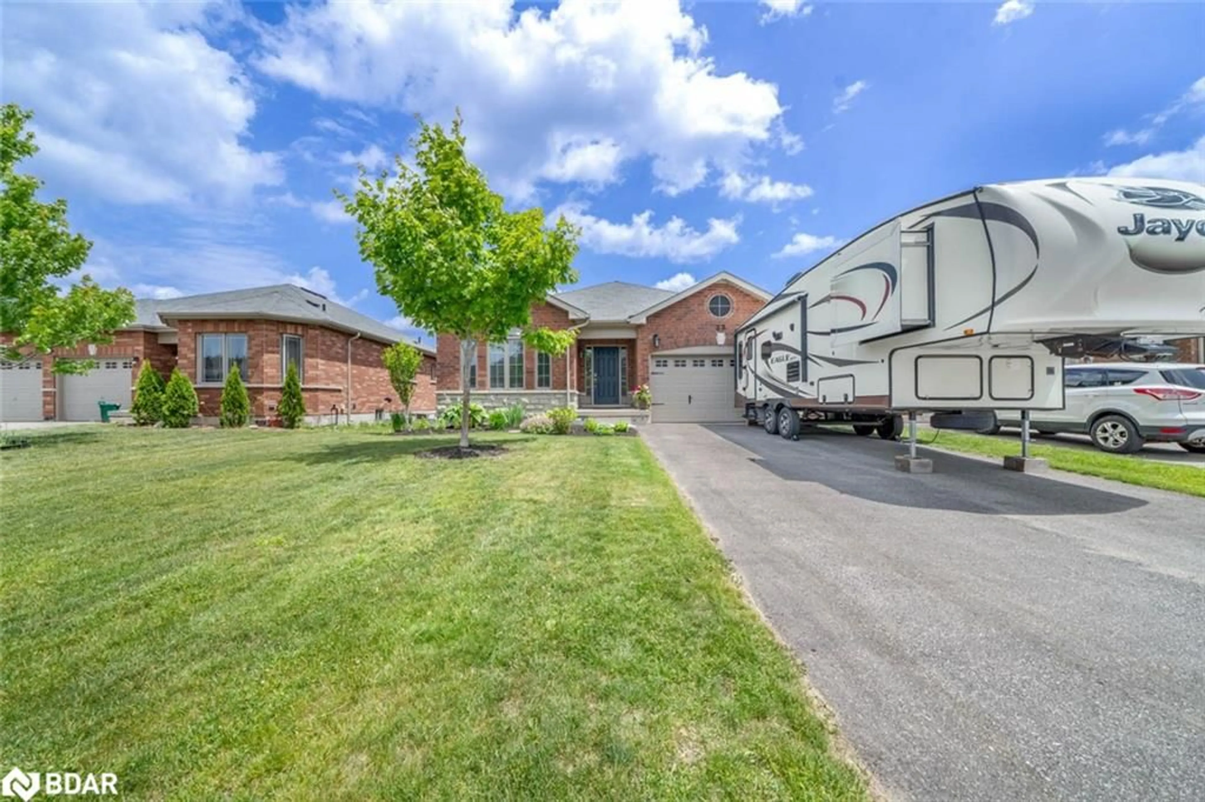Home with brick exterior material, street for 23 Hatton Drive, Penetanguishene Ontario L9M 0V7