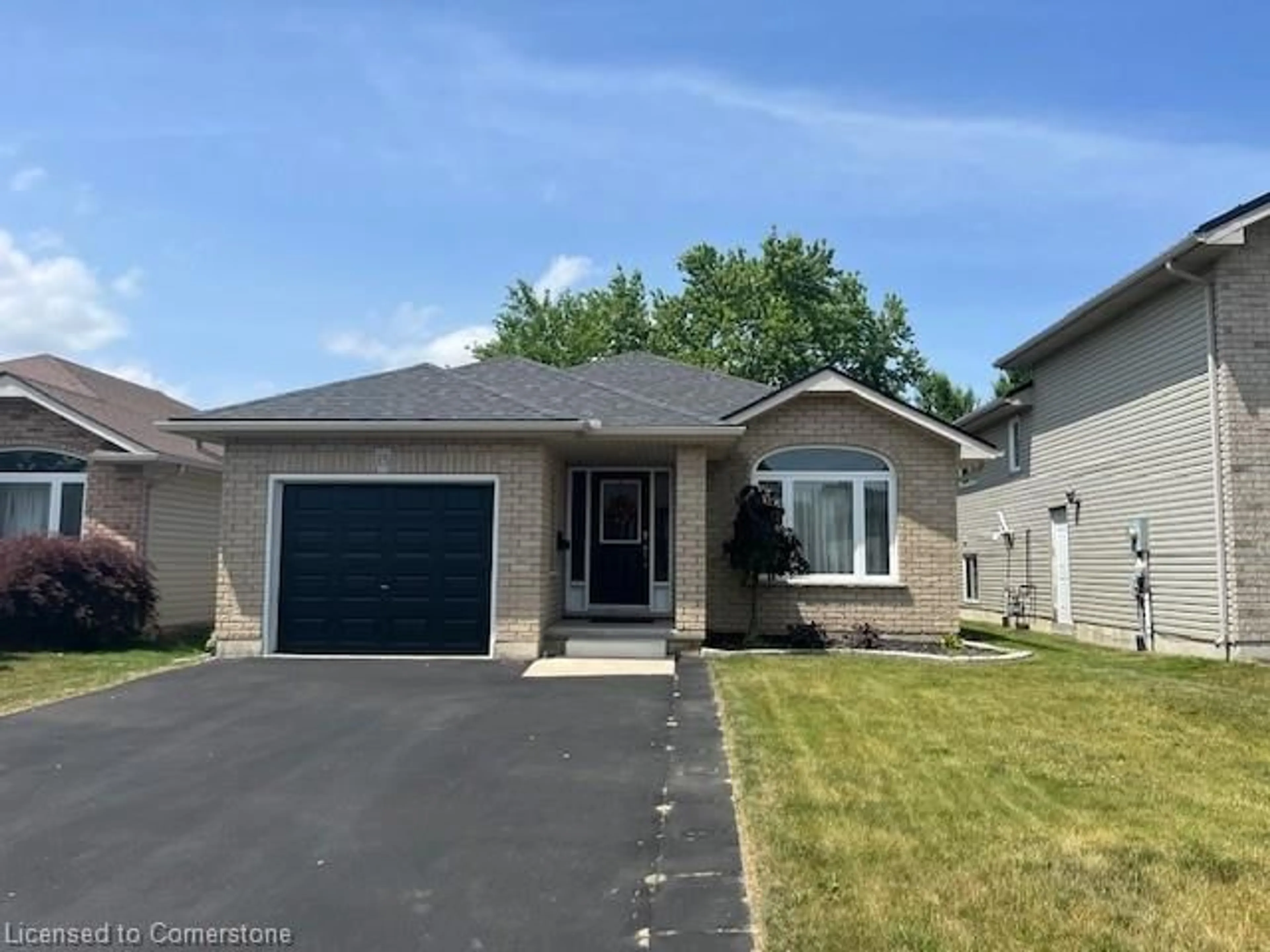 Home with vinyl exterior material, street for 15 Landon Ave, Simcoe Ontario N3Y 5J8