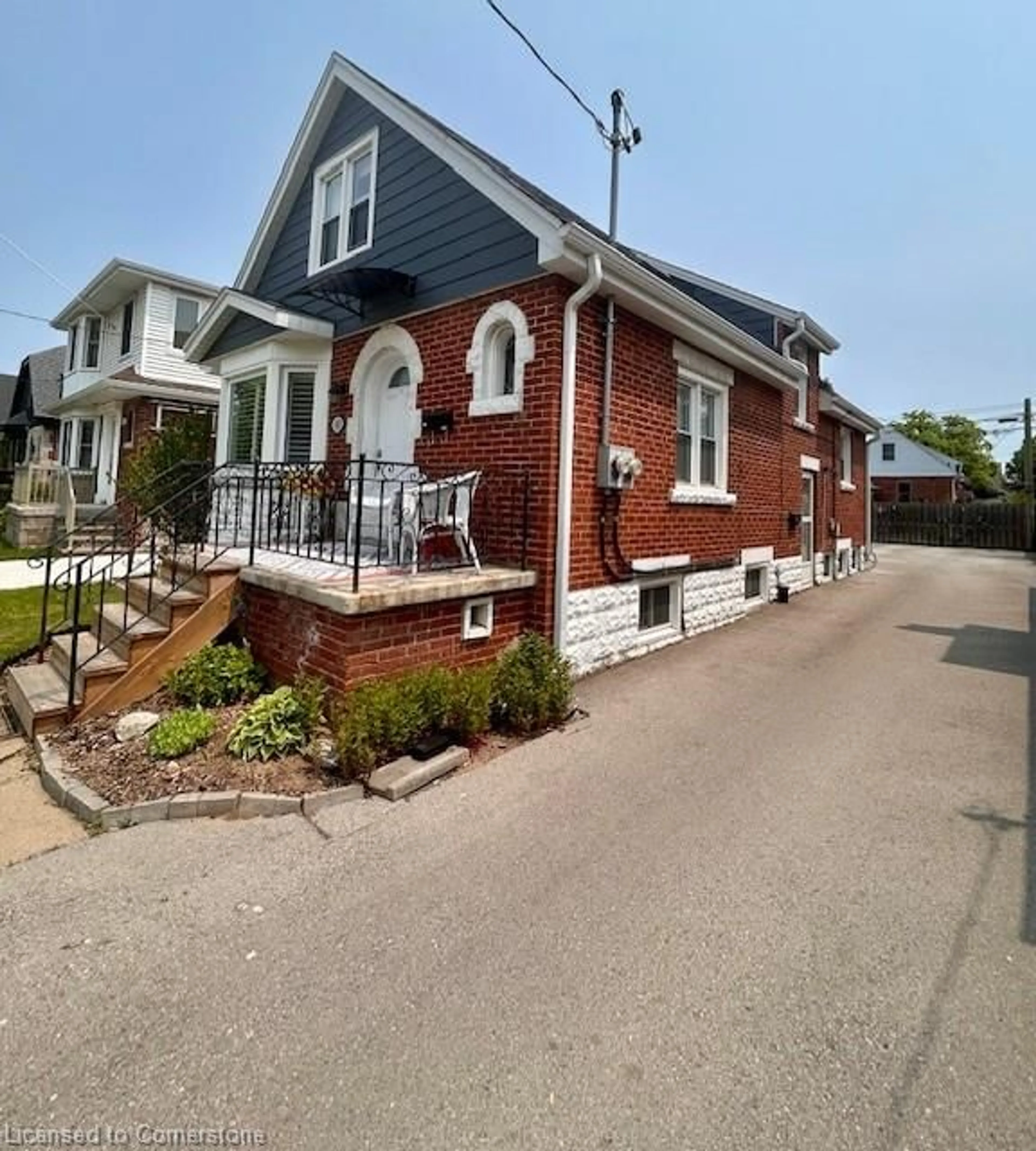 Home with brick exterior material, street for 143 Tuxedo Ave, Hamilton Ontario L8K 2S2