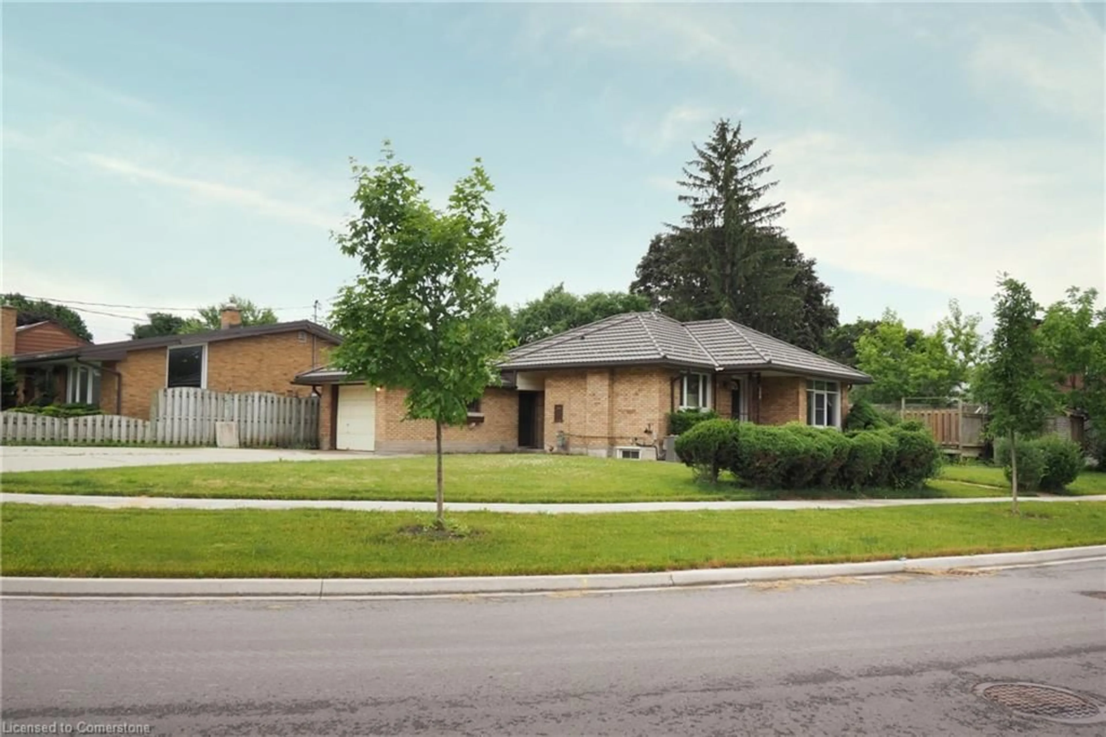 Home with brick exterior material, street for 109 Fife Ave, Kitchener Ontario N2B 1N2