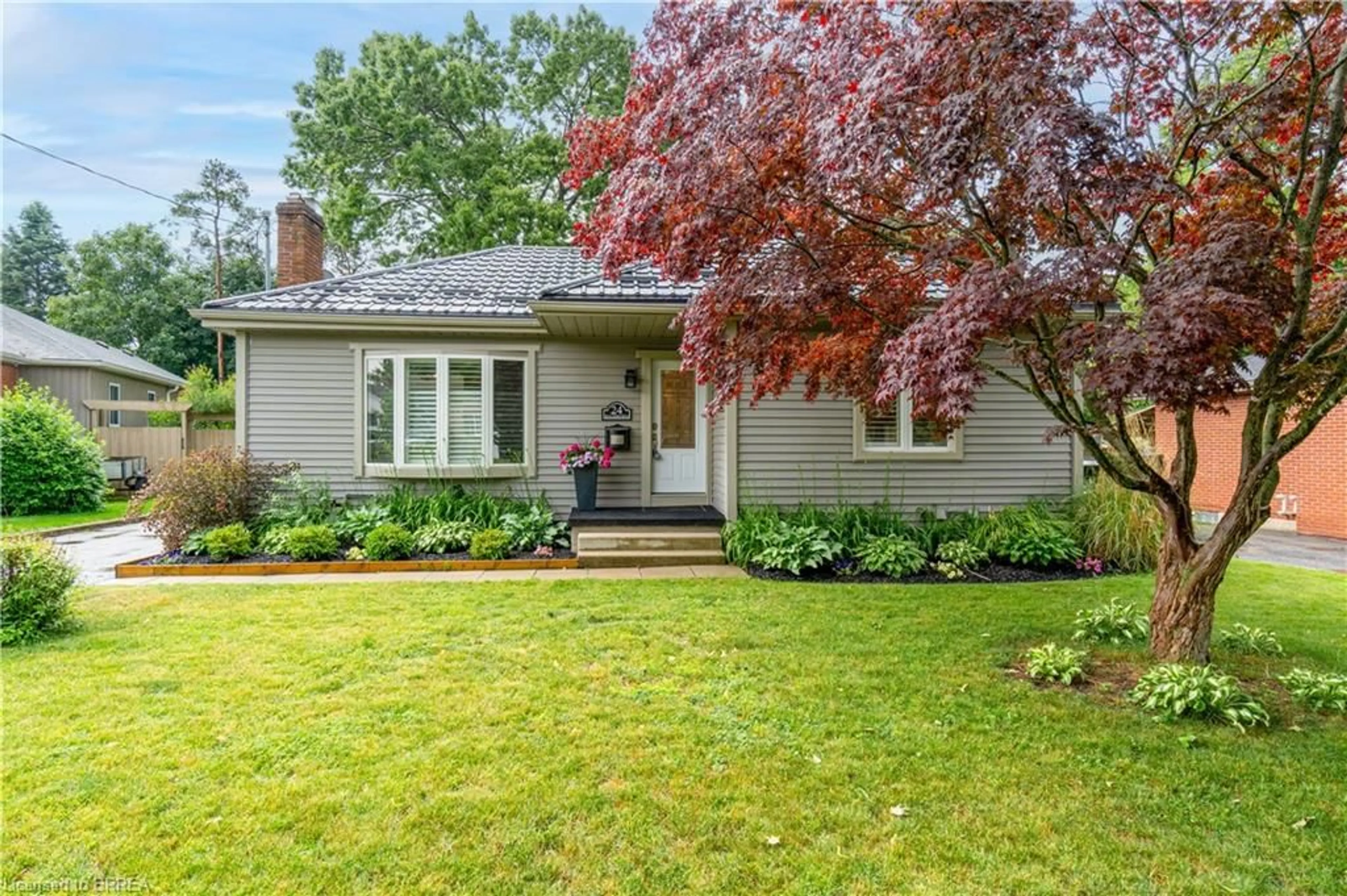Home with brick exterior material, street for 24 Hillier Cres, Brantford Ontario N3R 1X1