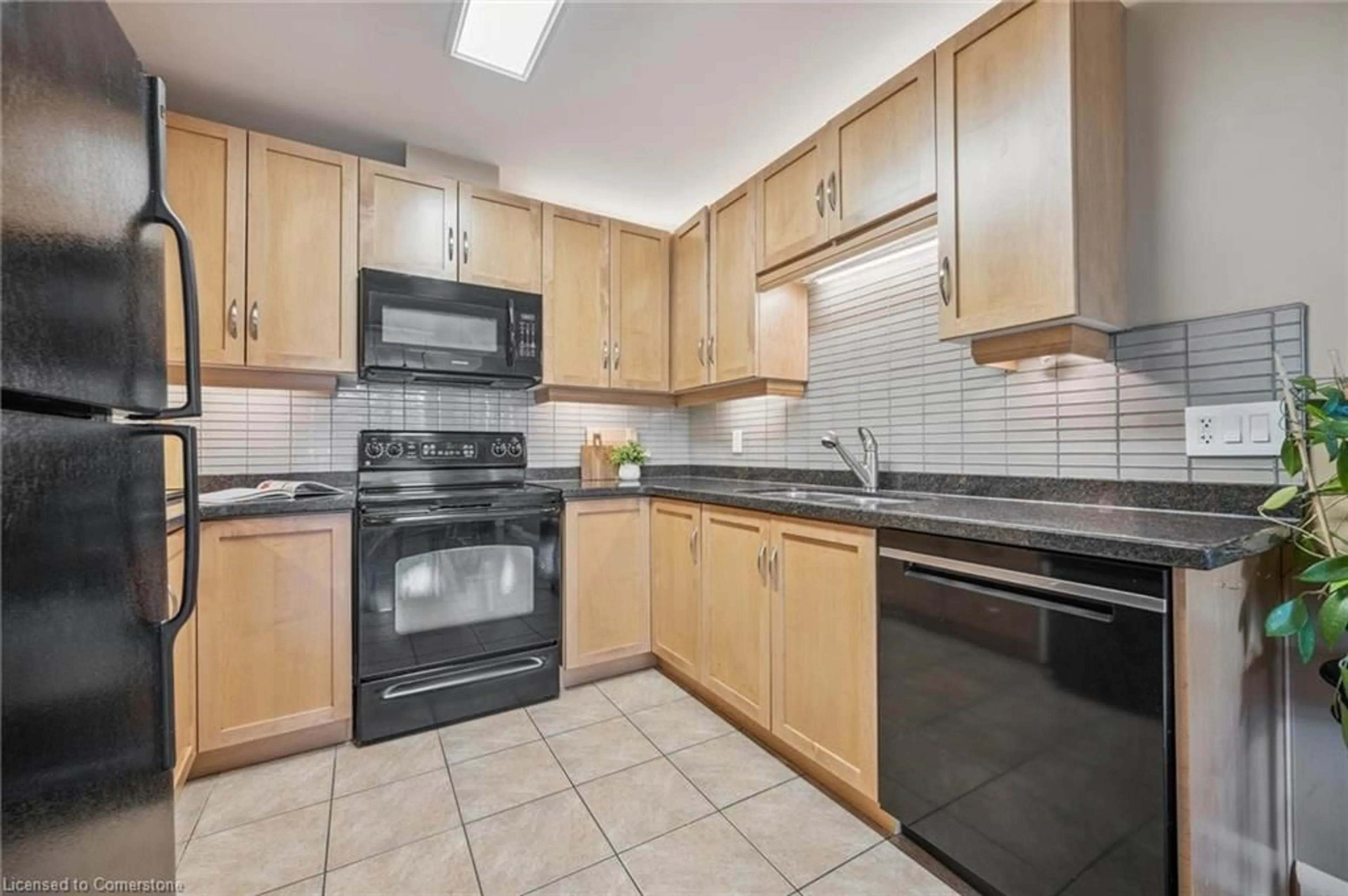 Standard kitchen, ceramic/tile floor for 165 Duke St #205, Kitchener Ontario N2H 6T8