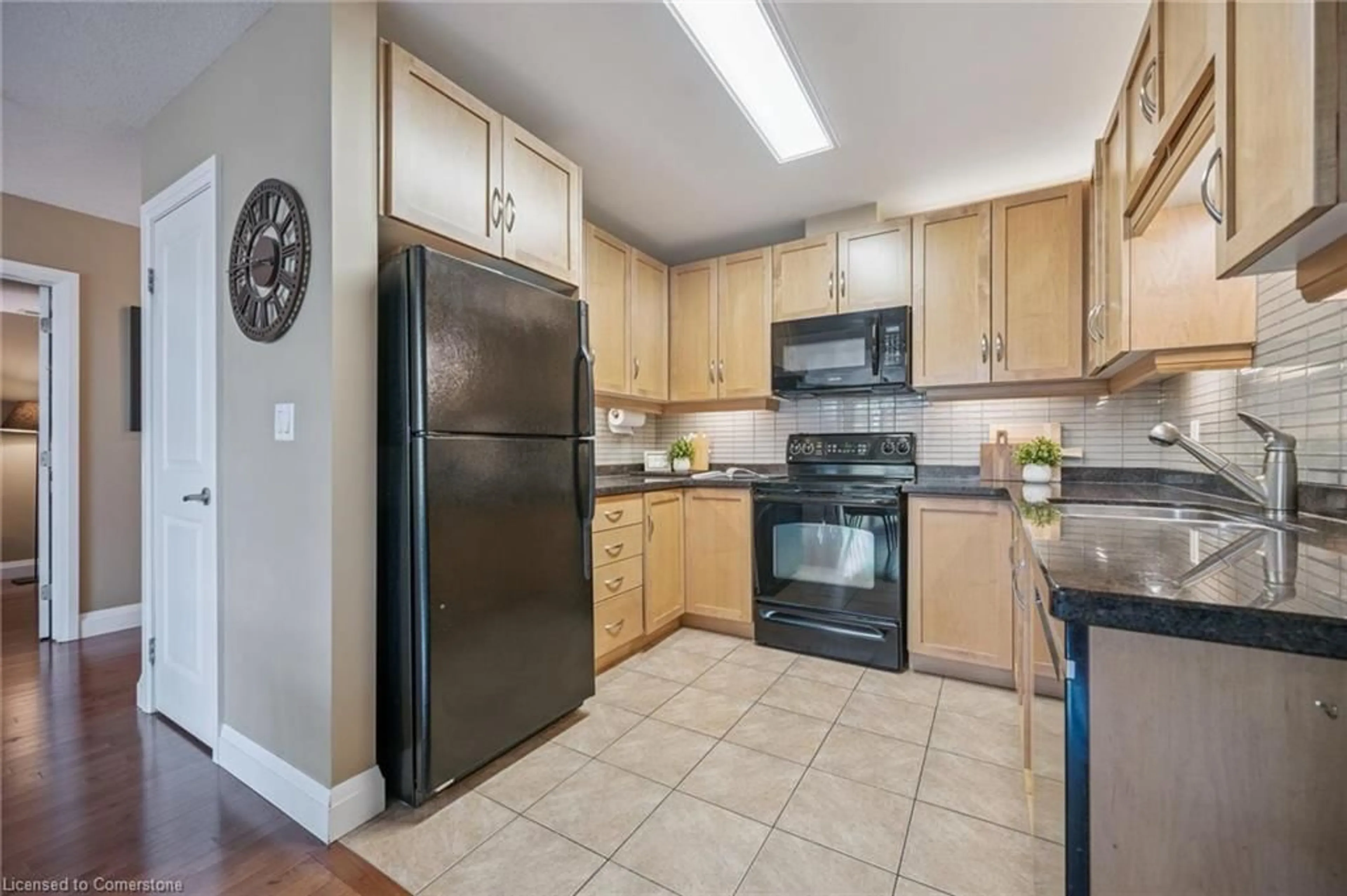 Standard kitchen, ceramic/tile floor for 165 Duke St #205, Kitchener Ontario N2H 6T8