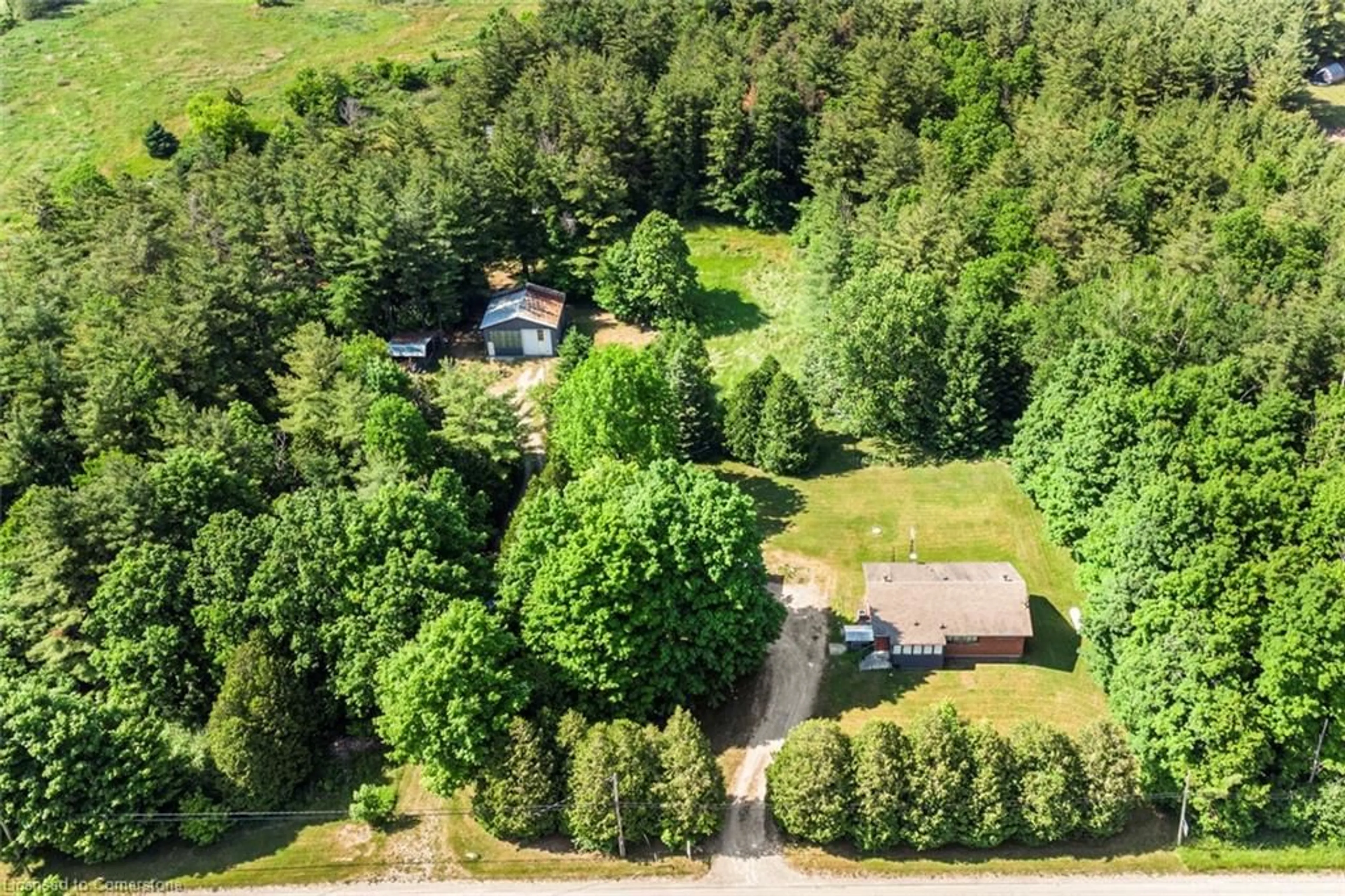 A pic from outside/outdoor area/front of a property/back of a property/a pic from drone, forest/trees view for 877 6th Concession Rd, Hamilton Ontario L8B 1M9