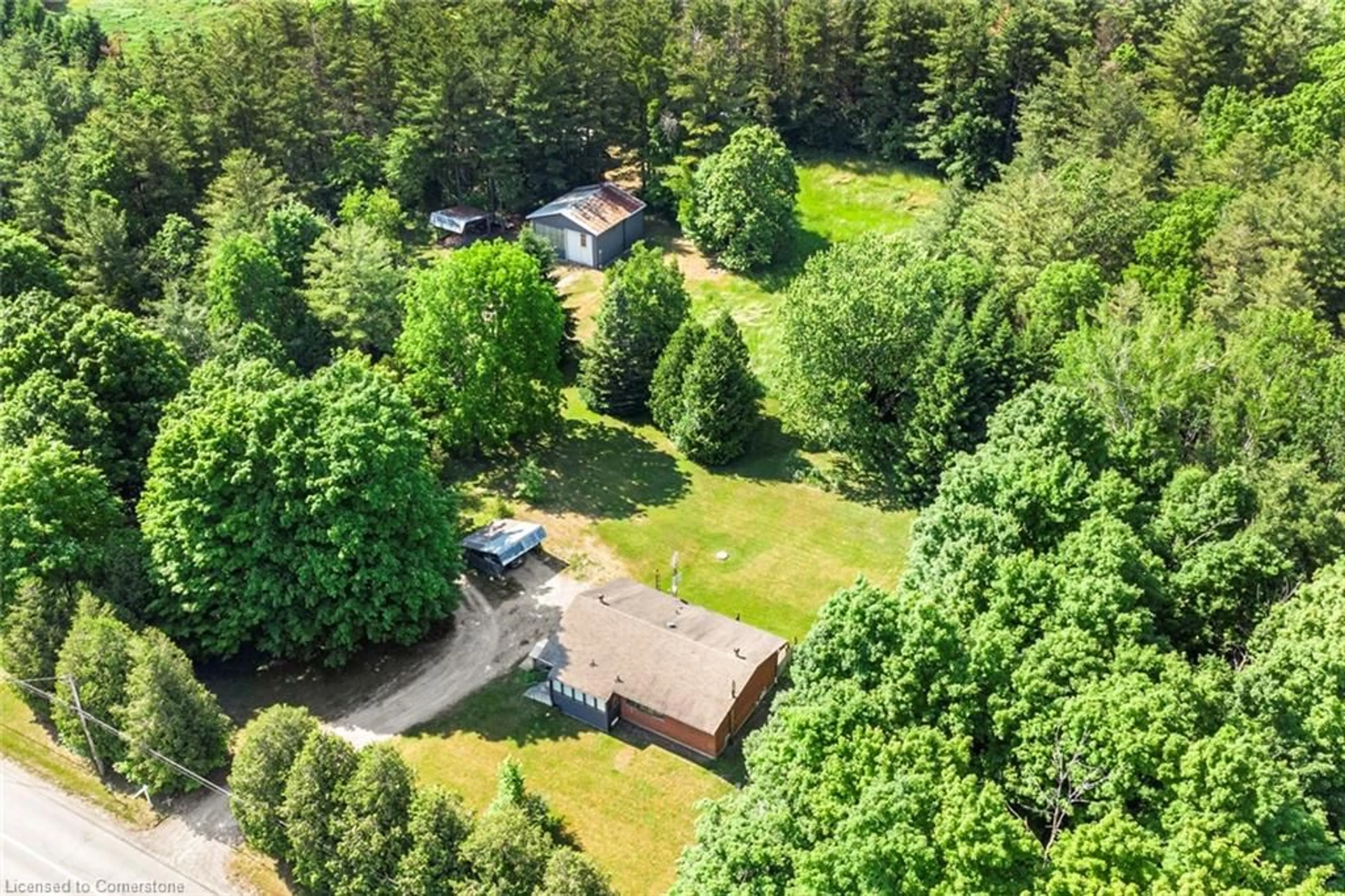 A pic from outside/outdoor area/front of a property/back of a property/a pic from drone, forest/trees view for 877 6th Concession Rd, Hamilton Ontario L8B 1M9