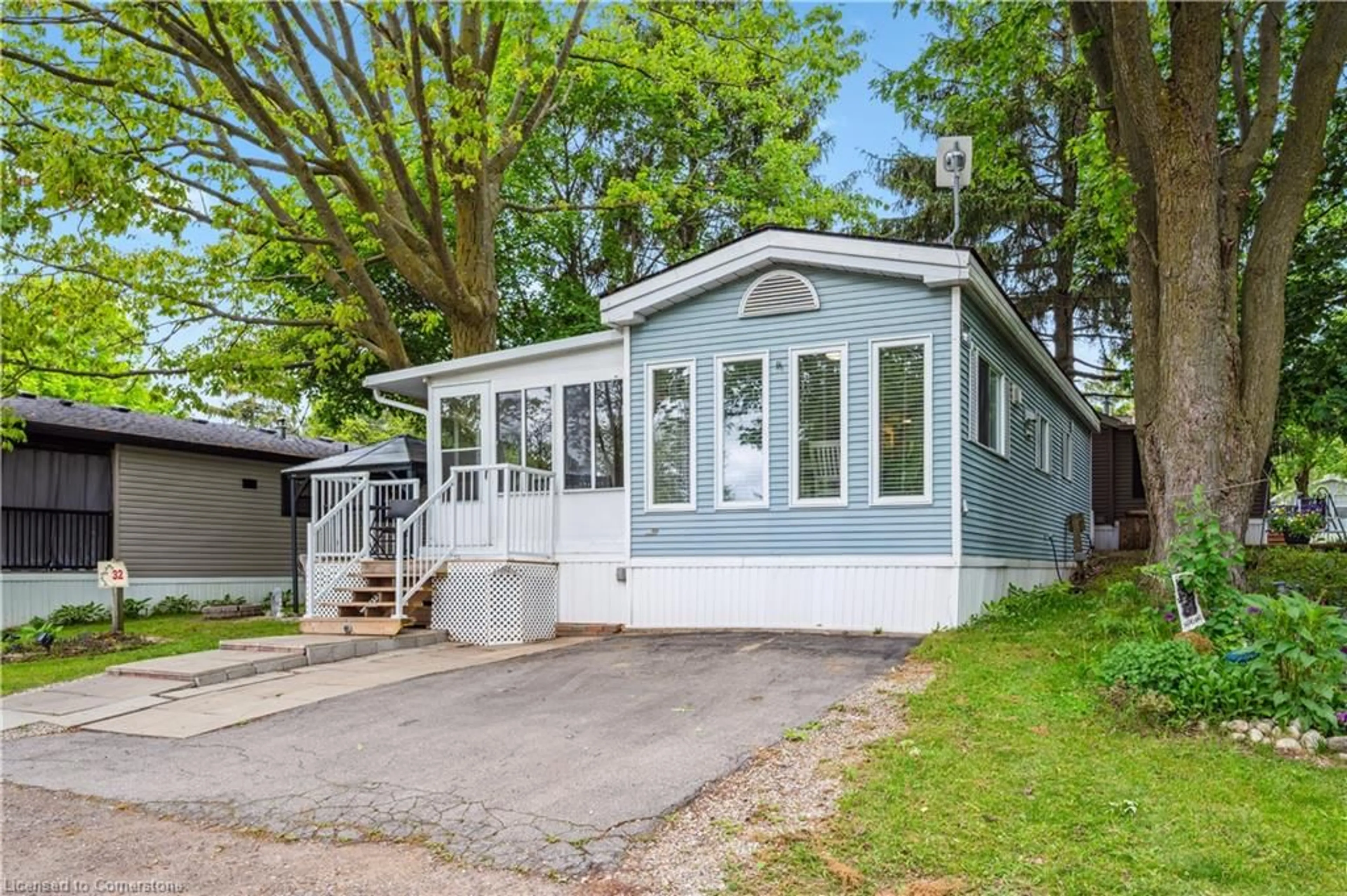 Home with vinyl exterior material, street for 580 Beaver Creek Rd #32, Waterloo Ontario N2J 3Z4