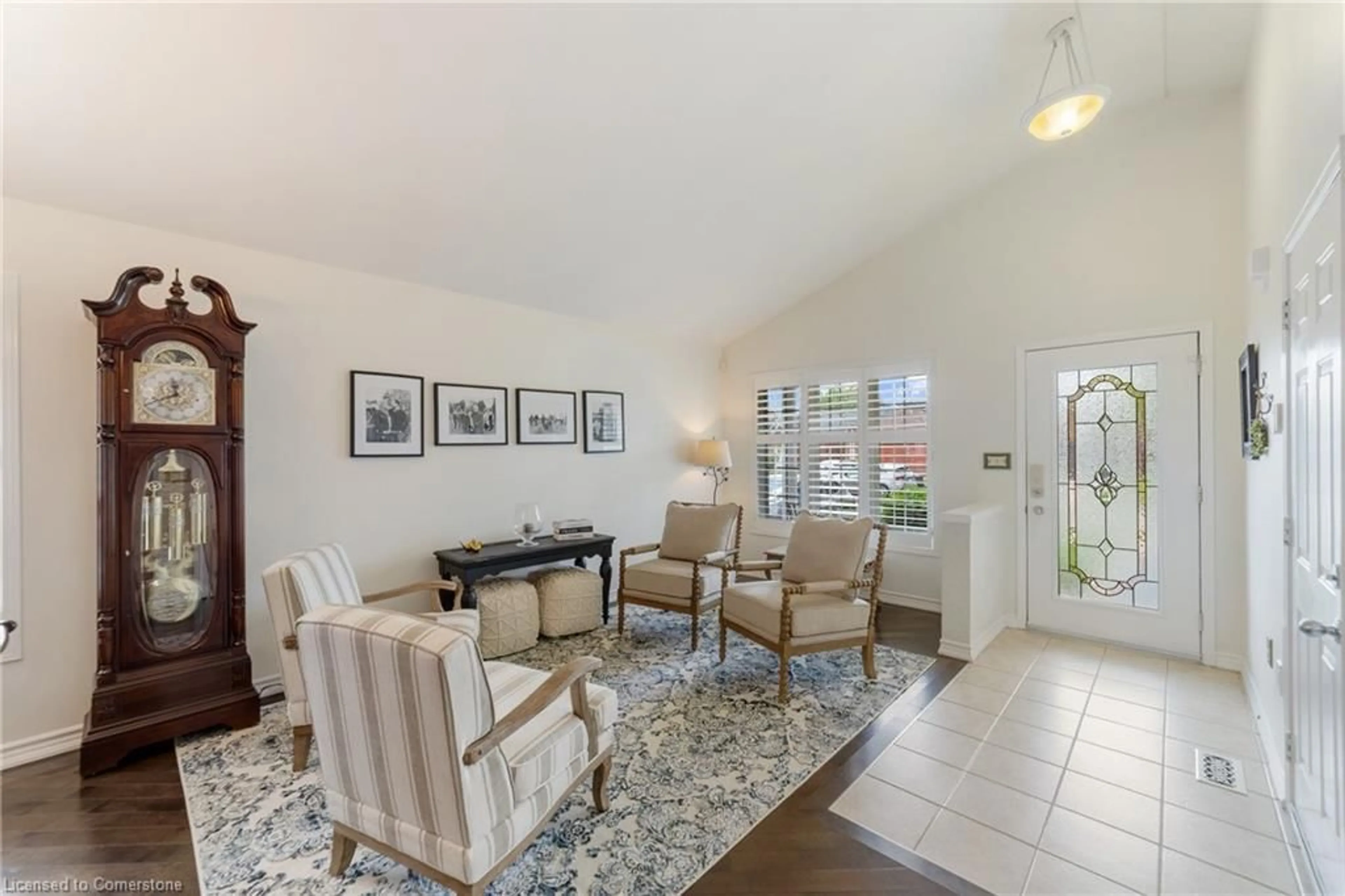 Living room with furniture, ceramic/tile floor for 54 Briarose Pl, Hamilton Ontario L9C 7V3