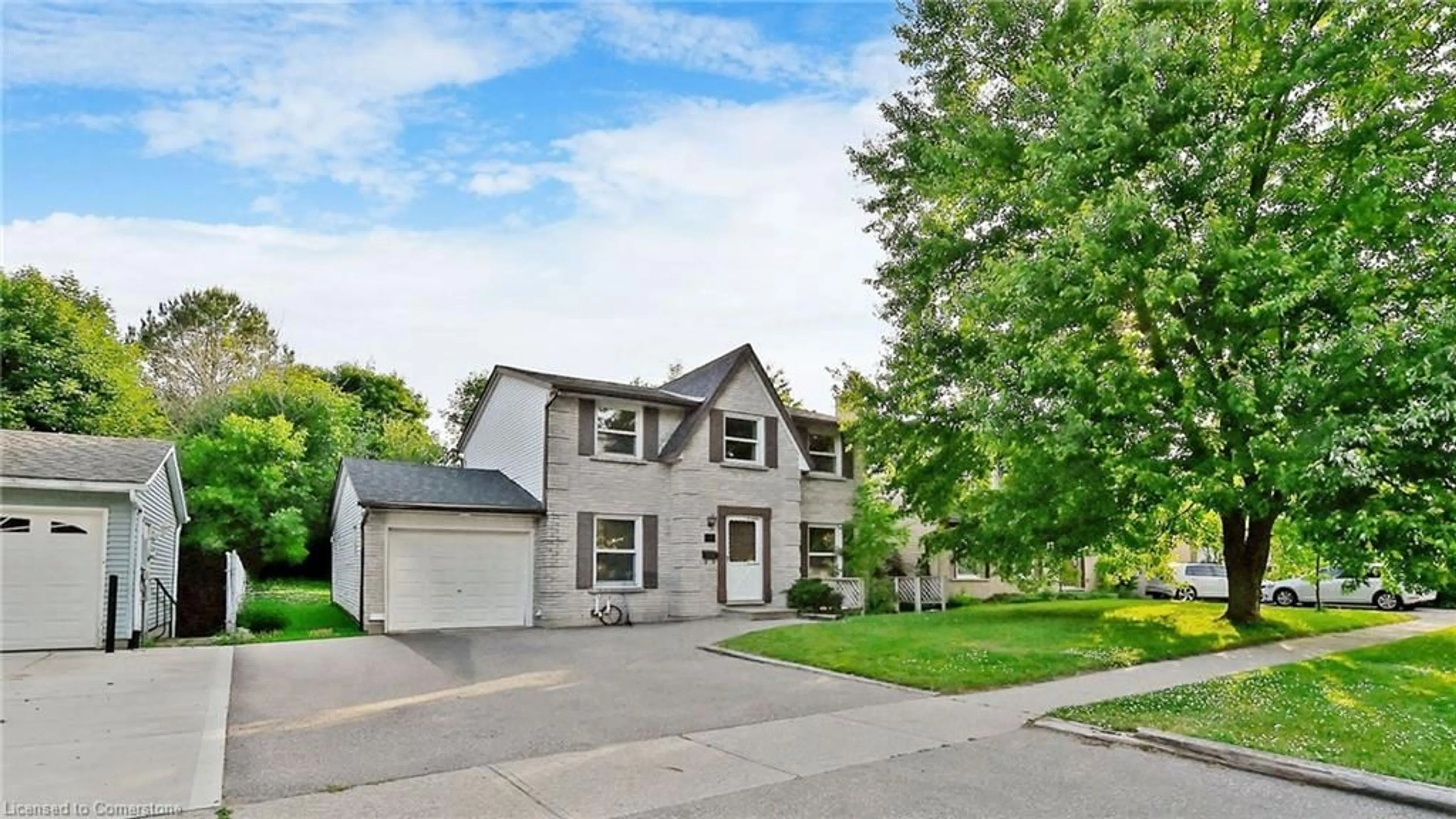 Home with vinyl exterior material, street for 23 Briarlea Rd, Guelph Ontario N1G 3H4
