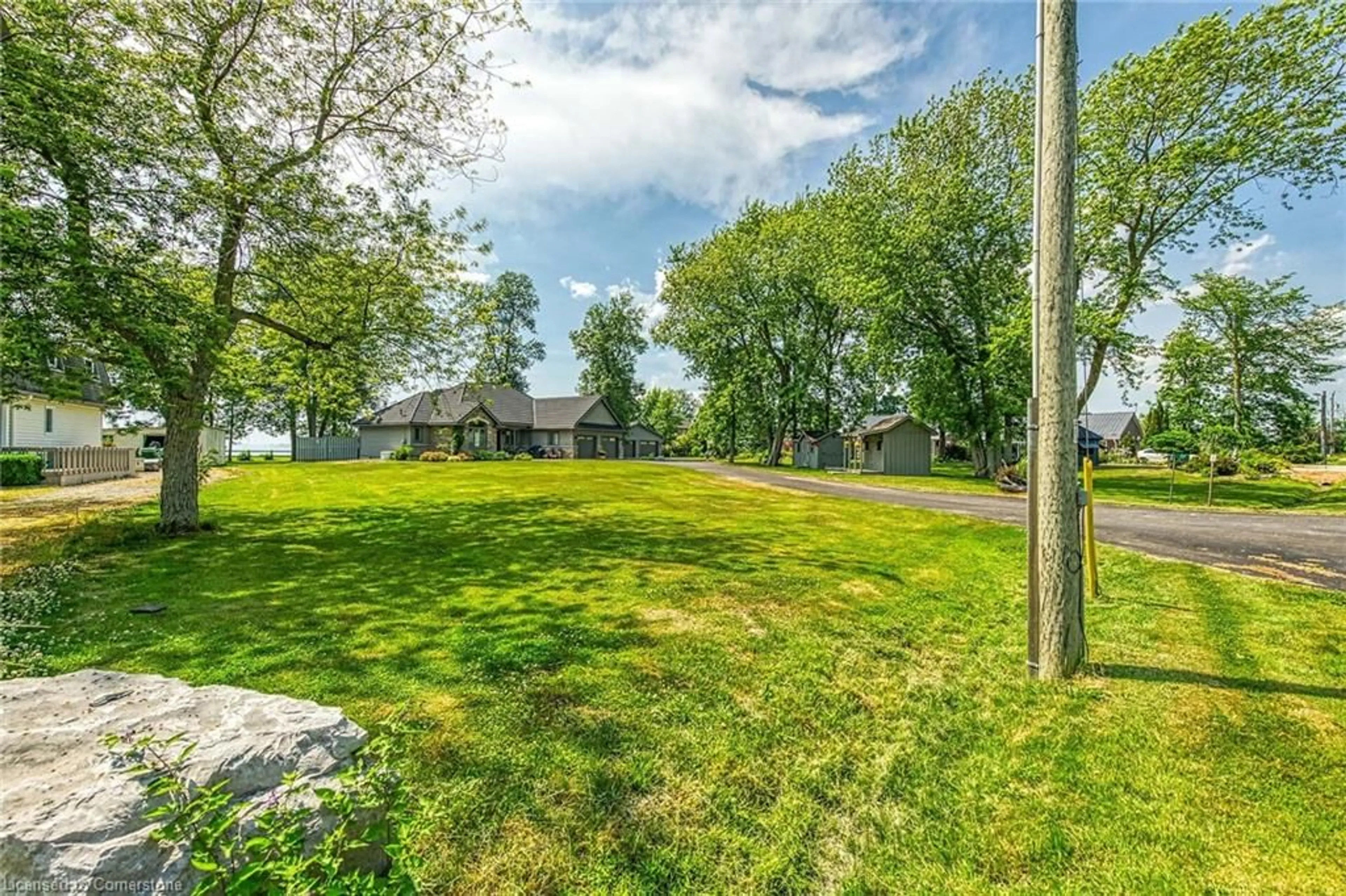 A pic from outside/outdoor area/front of a property/back of a property/a pic from drone, water/lake/river/ocean view for 17 Bates Lane, Dunnville Ontario N1A 2W8
