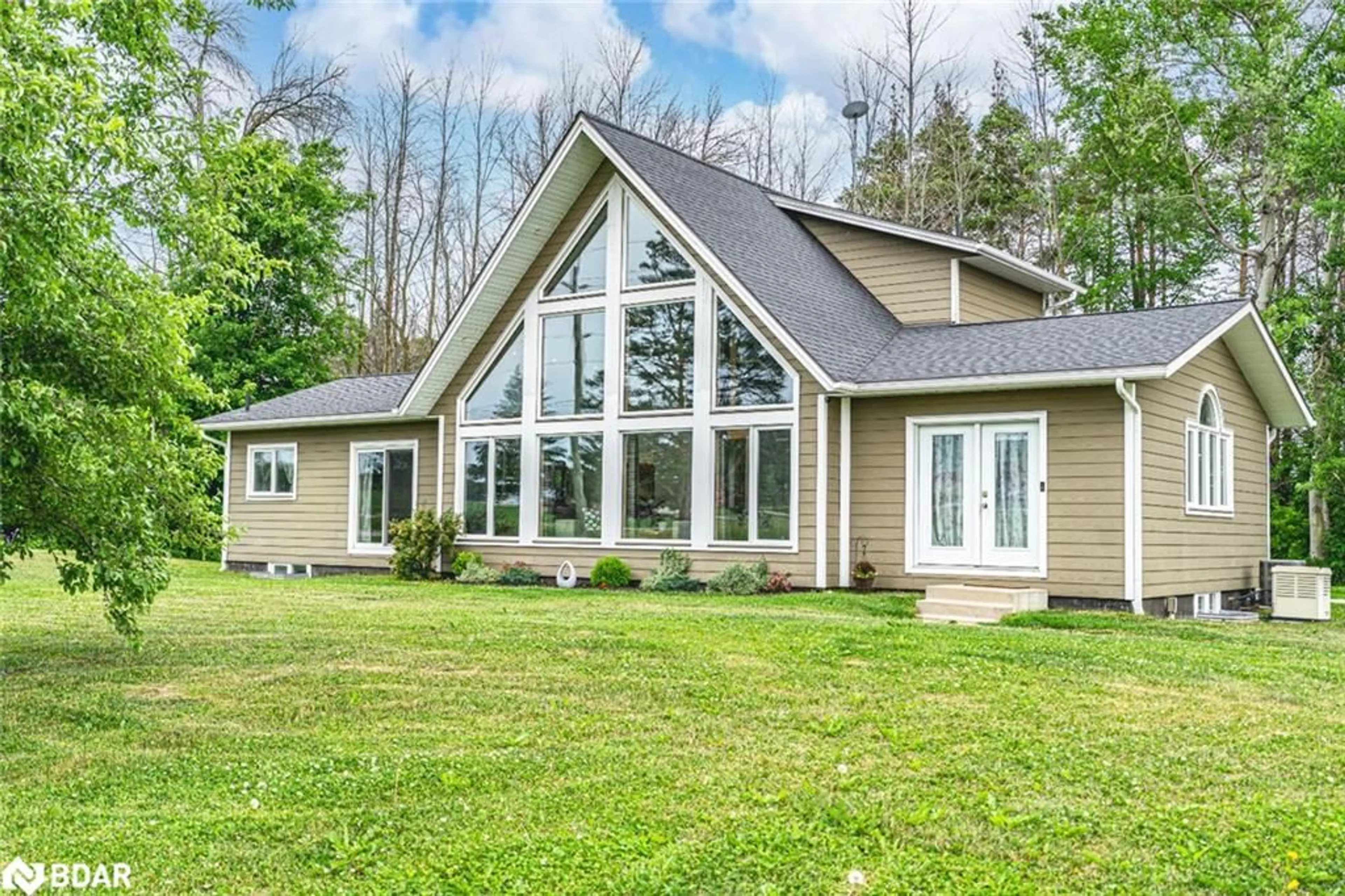 Home with vinyl exterior material, unknown for 1783 County Road 6 South, Springwater Ontario L0L 1P0