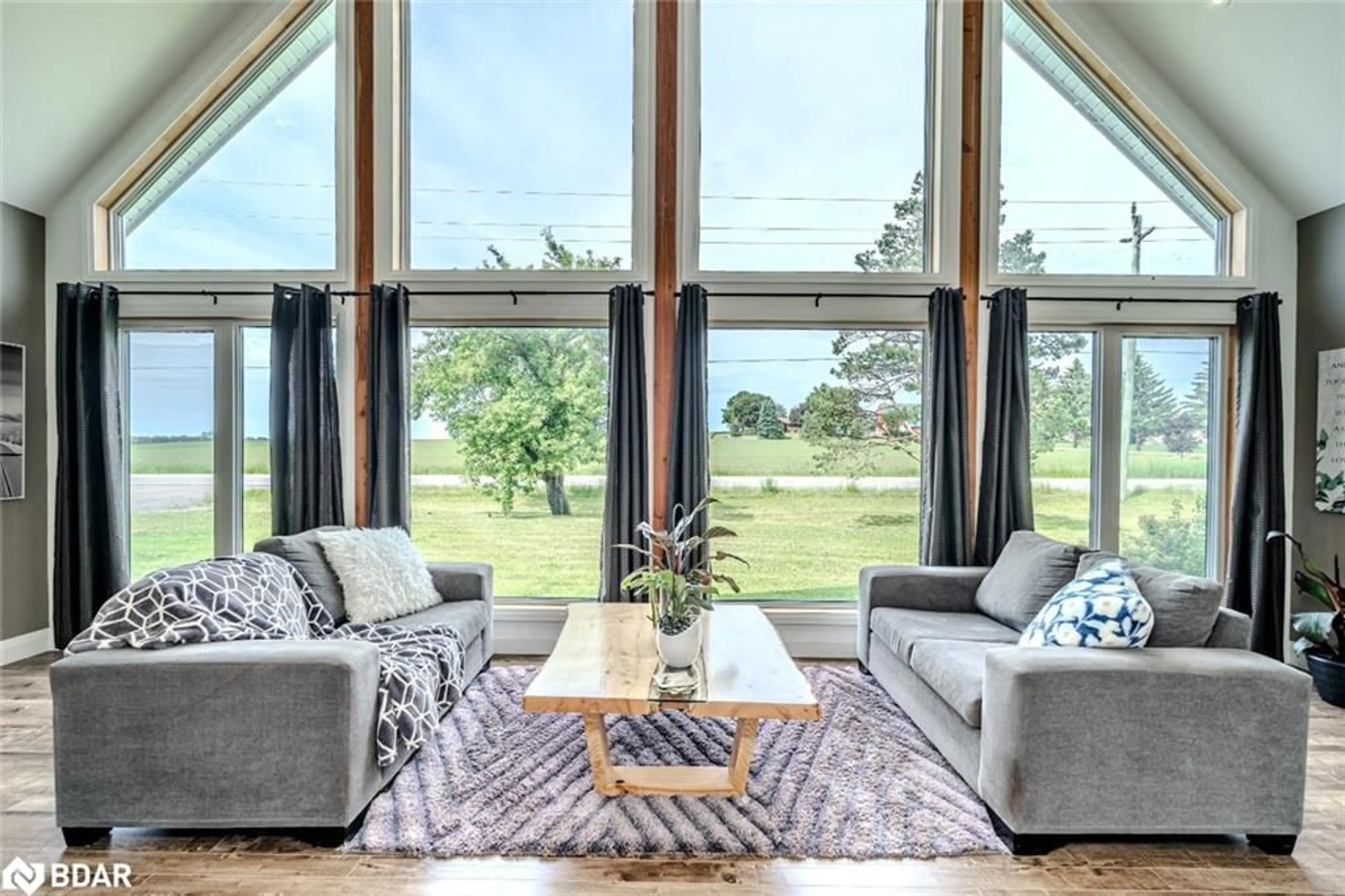 Living room with furniture, unknown for 1783 County Road 6 South, Springwater Ontario L0L 1P0