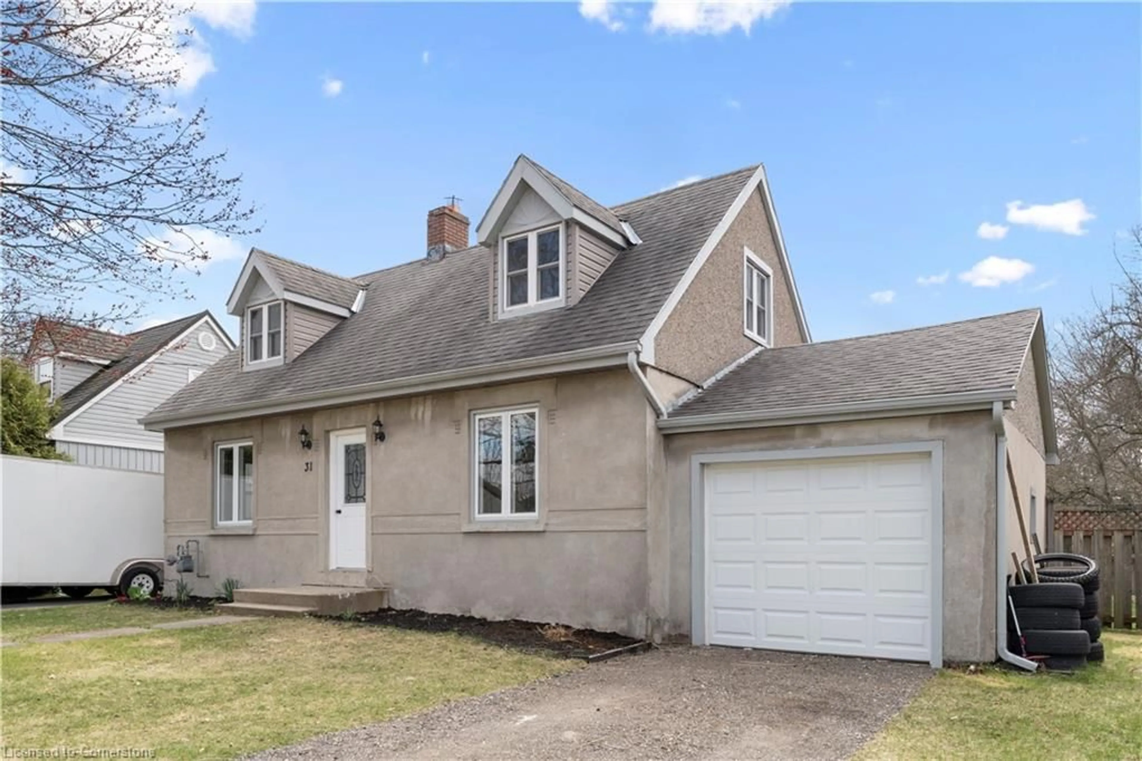 Home with vinyl exterior material, street for 31 George St, Langton Ontario N0E 1G0