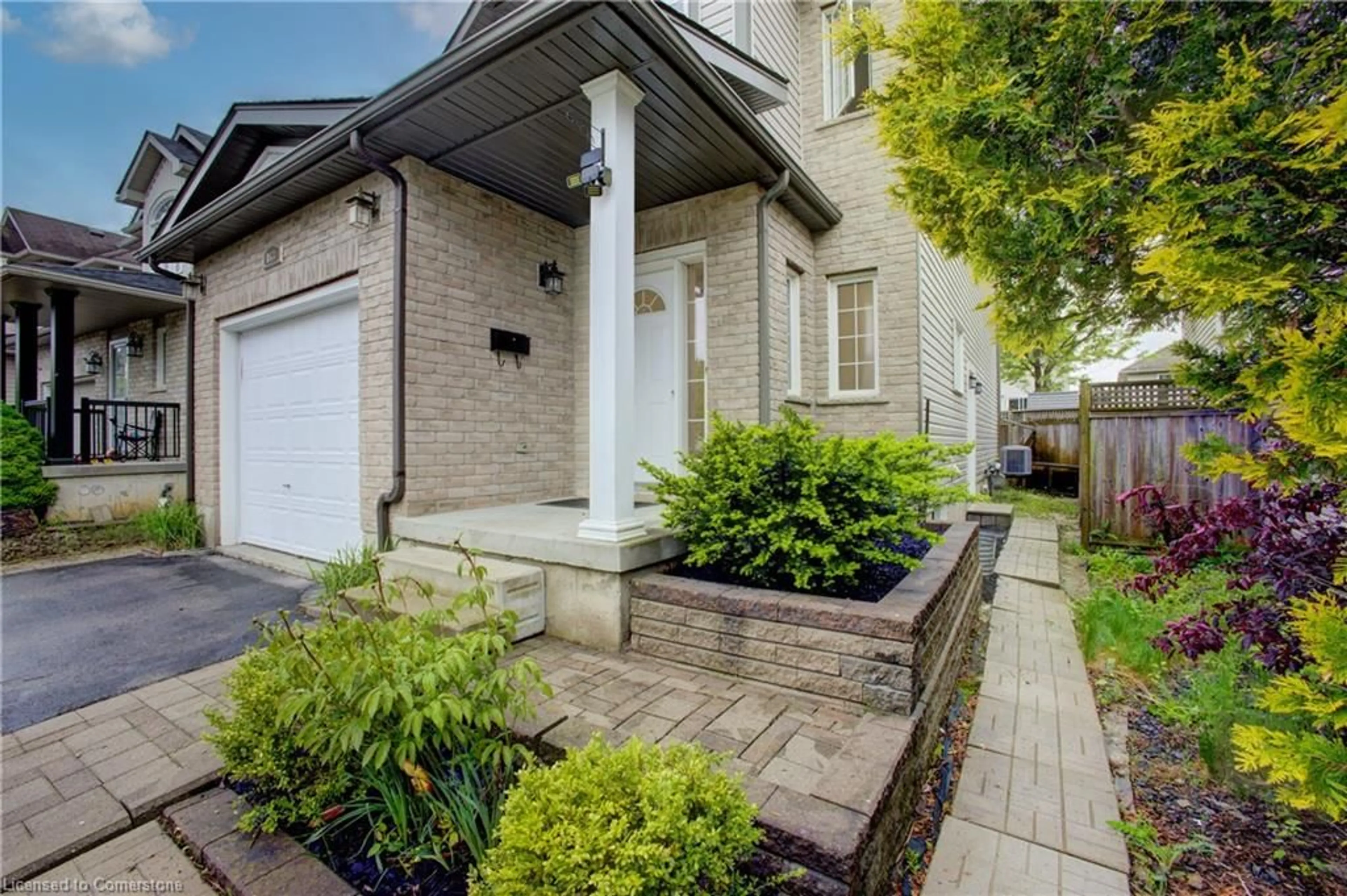 Home with brick exterior material, street for 863 Laurelwood Dr, Waterloo Ontario N2V 2X8