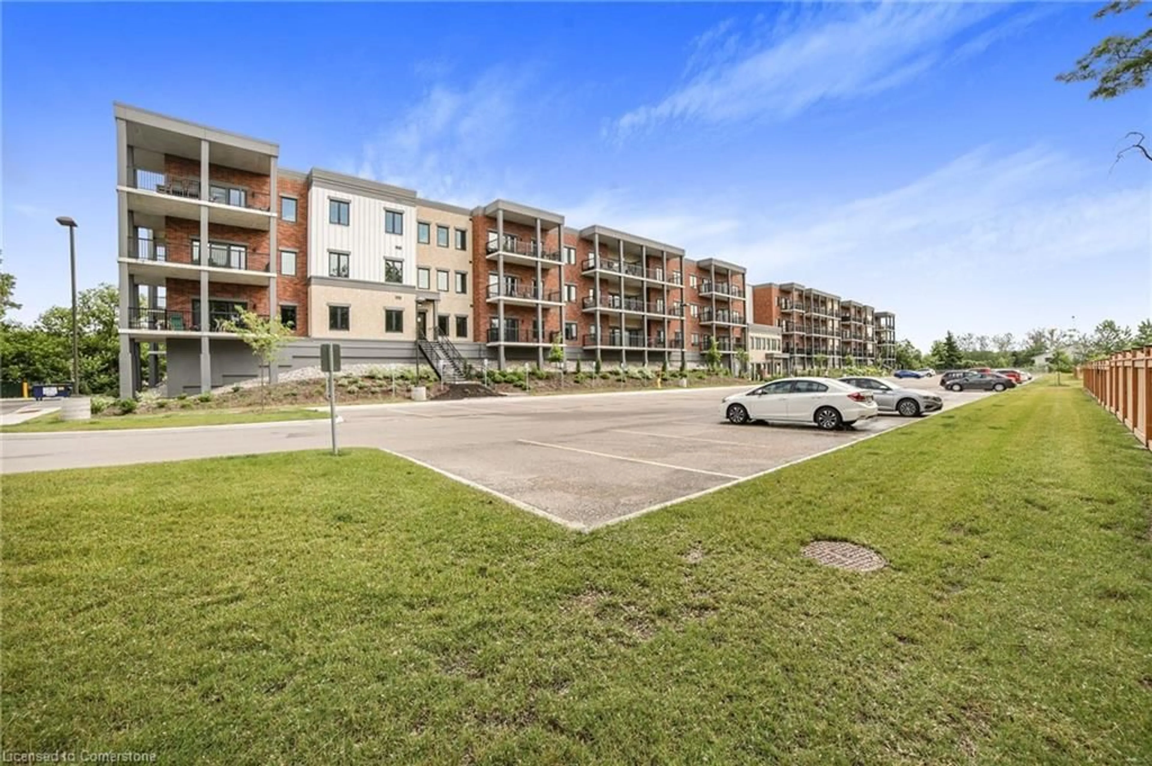 A pic from outside/outdoor area/front of a property/back of a property/a pic from drone, water/lake/river/ocean view for 121 Mary St #402, Creemore Ontario L0M 1G0