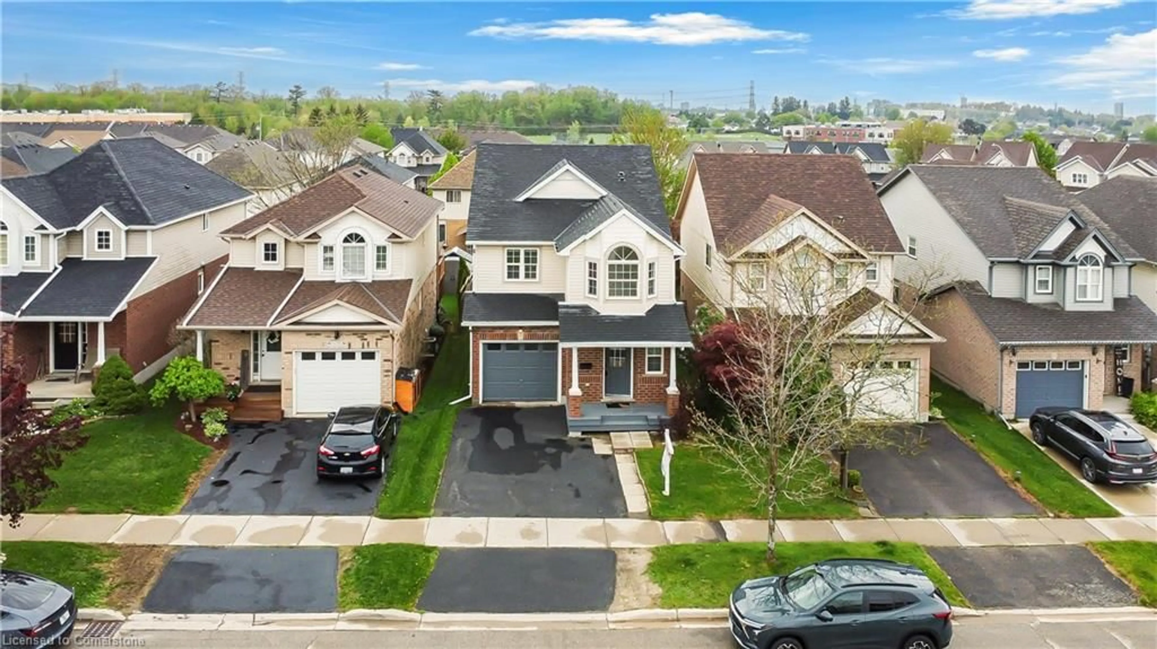 A pic from outside/outdoor area/front of a property/back of a property/a pic from drone, street for 74 Blue Lace Cres, Kitchener Ontario N2E 3X1