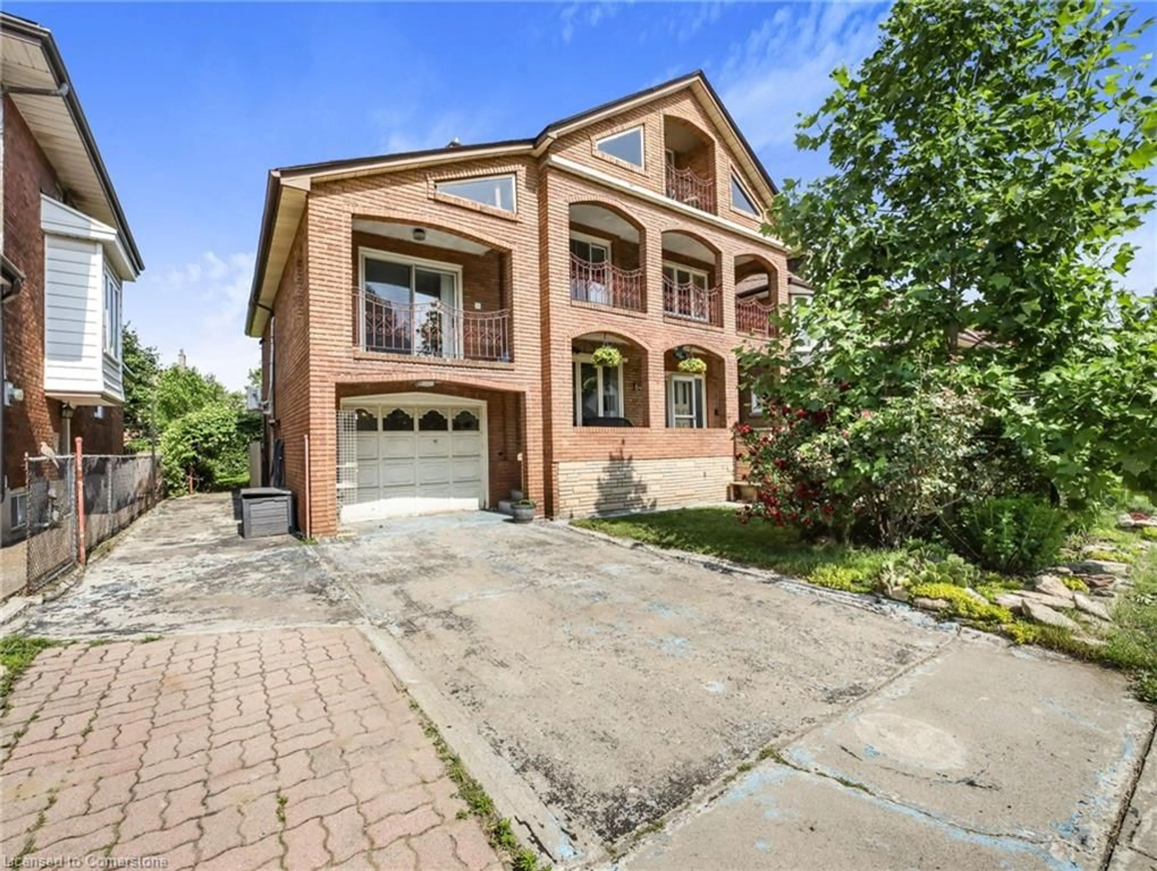 Home with brick exterior material, street for 64 Kensington Ave, Hamilton Ontario L8M 3H2