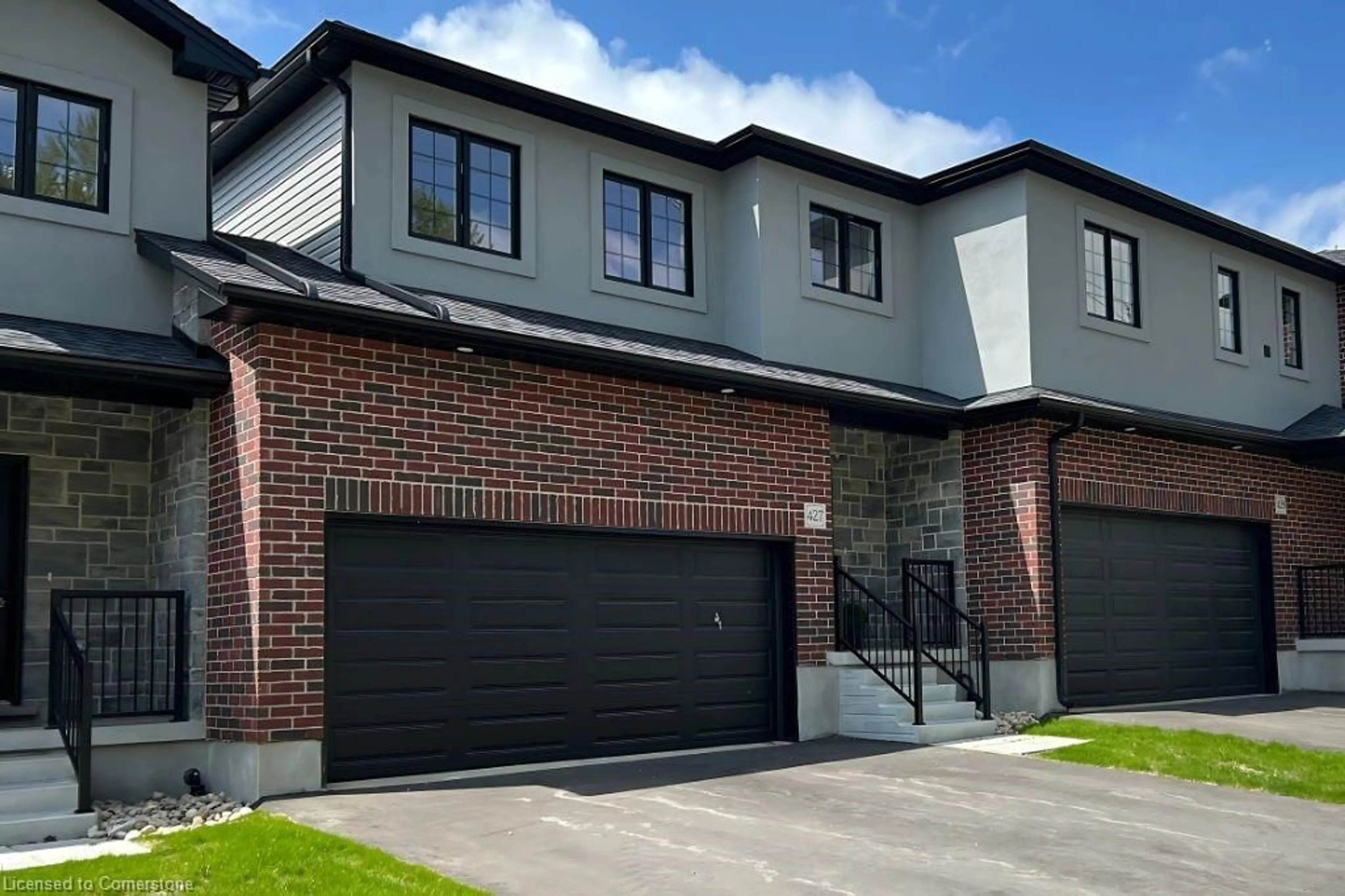 Home with brick exterior material, street for 423 Woolwich St, Waterloo Ontario N2K 0E8