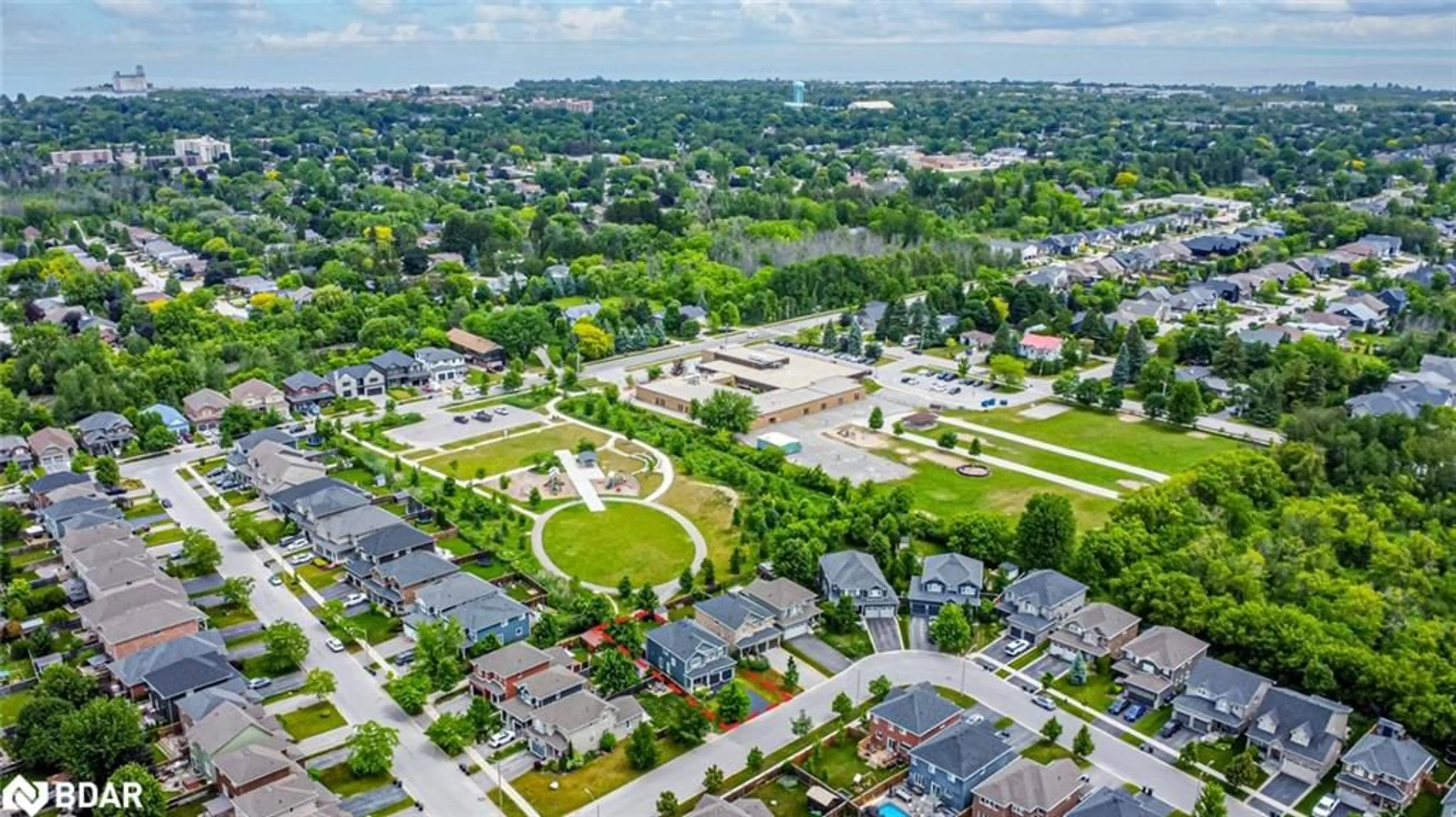 A pic from outside/outdoor area/front of a property/back of a property/a pic from drone, street for 7 Garbutt Cres, Collingwood Ontario L9Y 0H5
