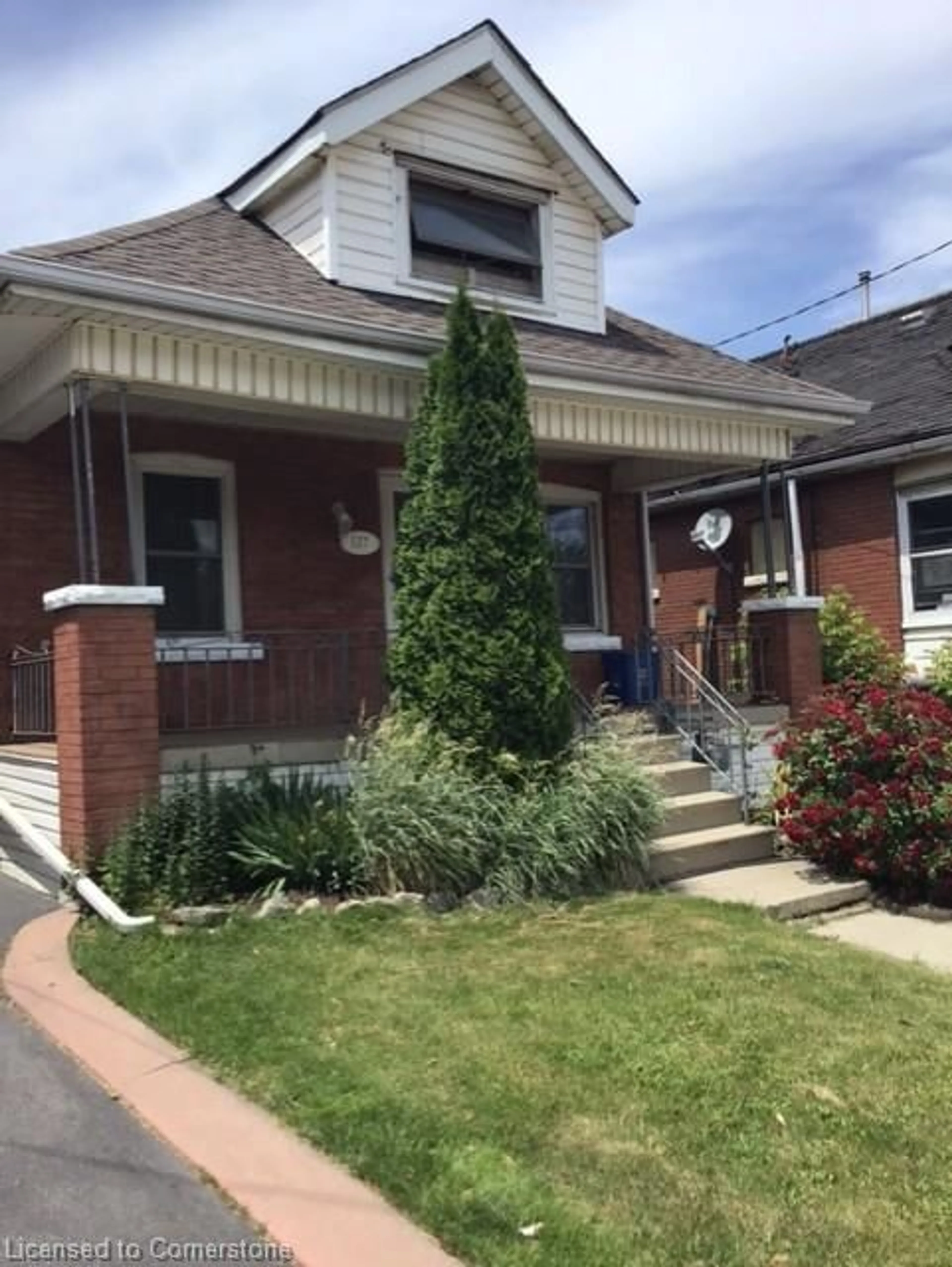 Home with brick exterior material, street for 157 Leinster Ave, Hamilton Ontario L8L 6Y1