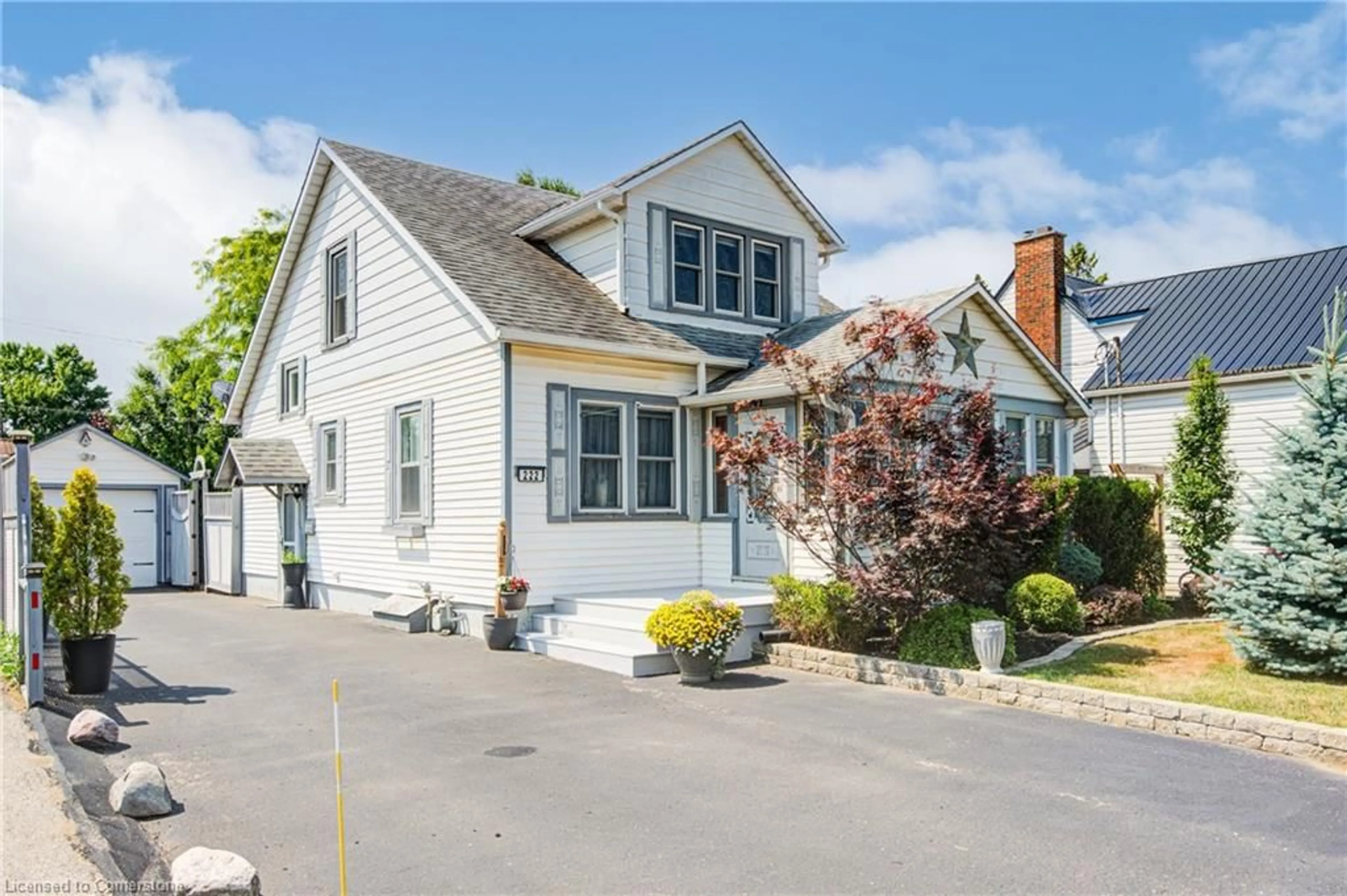 Home with vinyl exterior material, street for 222 Church St, Delhi Ontario N4B 1T9