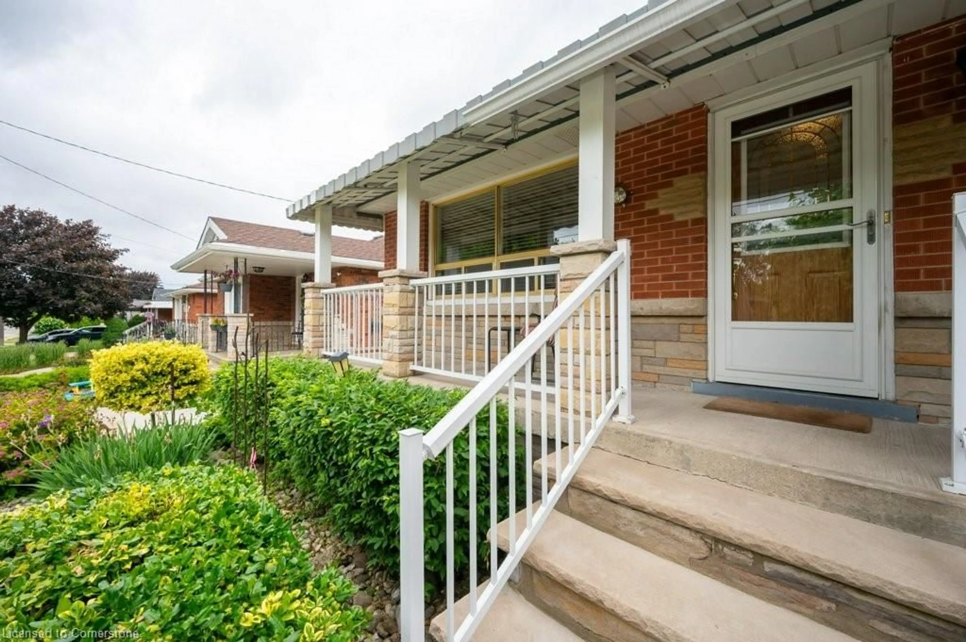 Home with brick exterior material, street for 327 East 42nd St, Hamilton Ontario L8T 3A6
