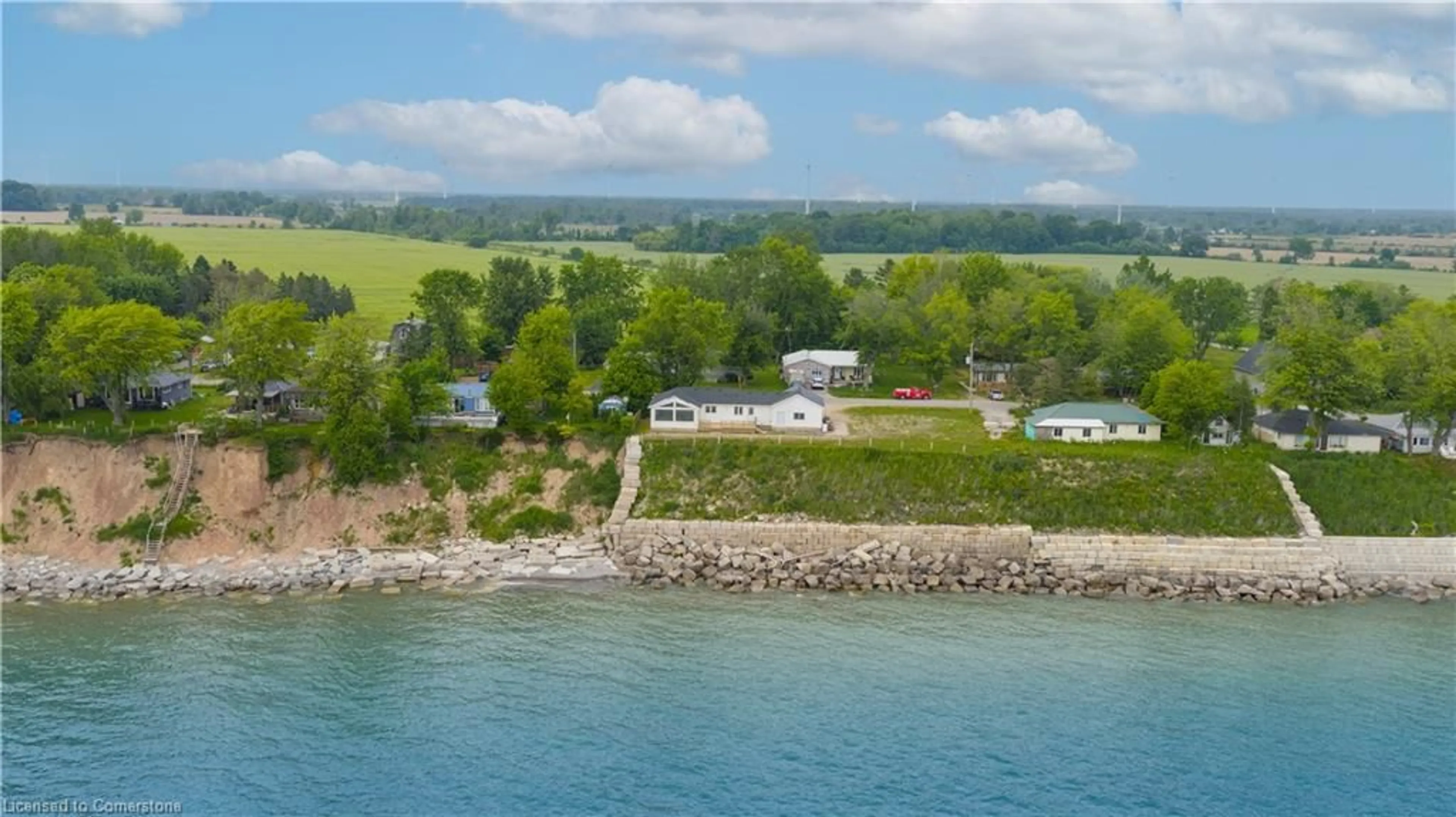 A pic from outside/outdoor area/front of a property/back of a property/a pic from drone, water/lake/river/ocean view for 21 Villella Rd, Dunnville Ontario N0A 1K0