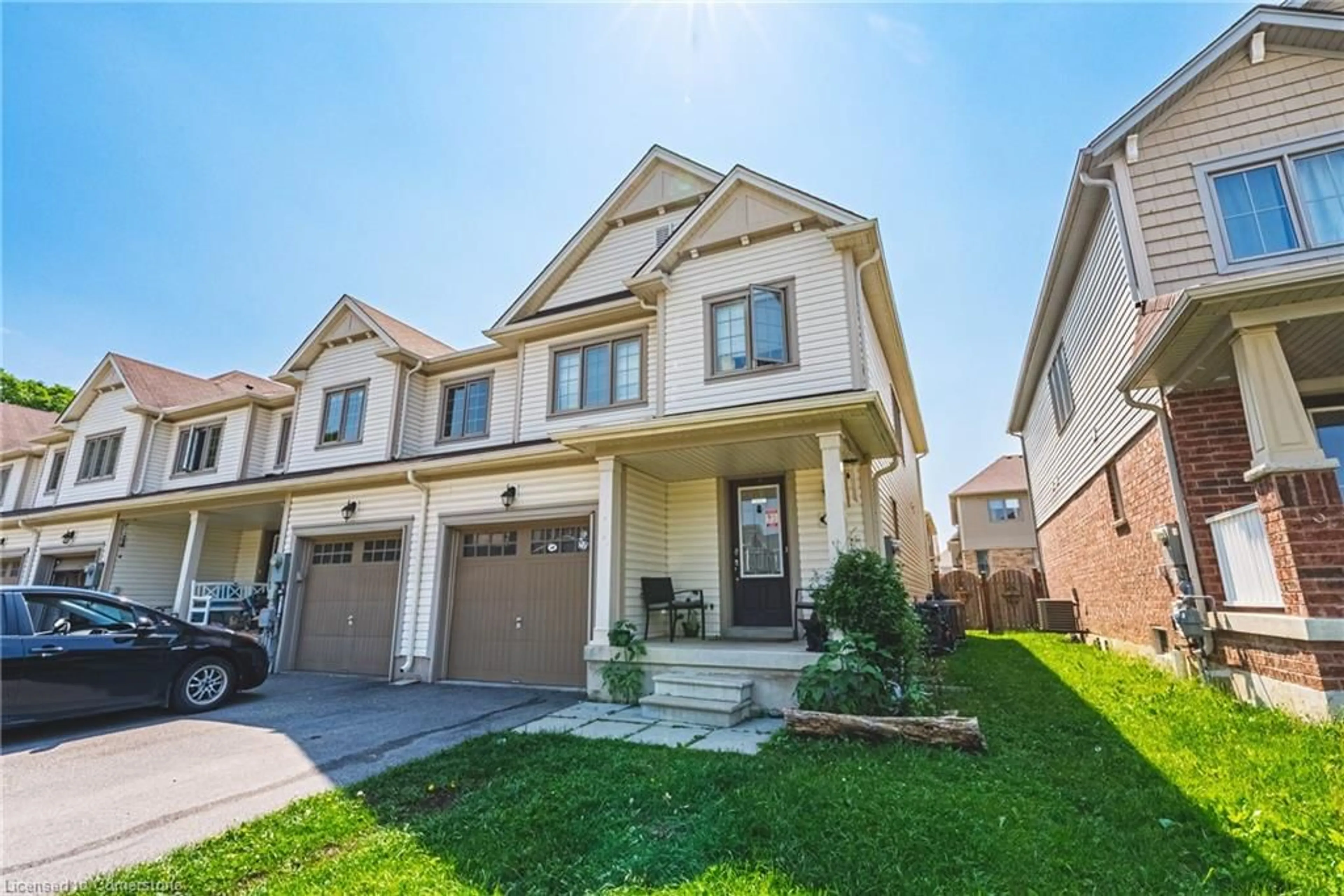 Home with brick exterior material, street for 8258 Tulip Tree Dr, Niagara Falls Ontario L2H 0N4