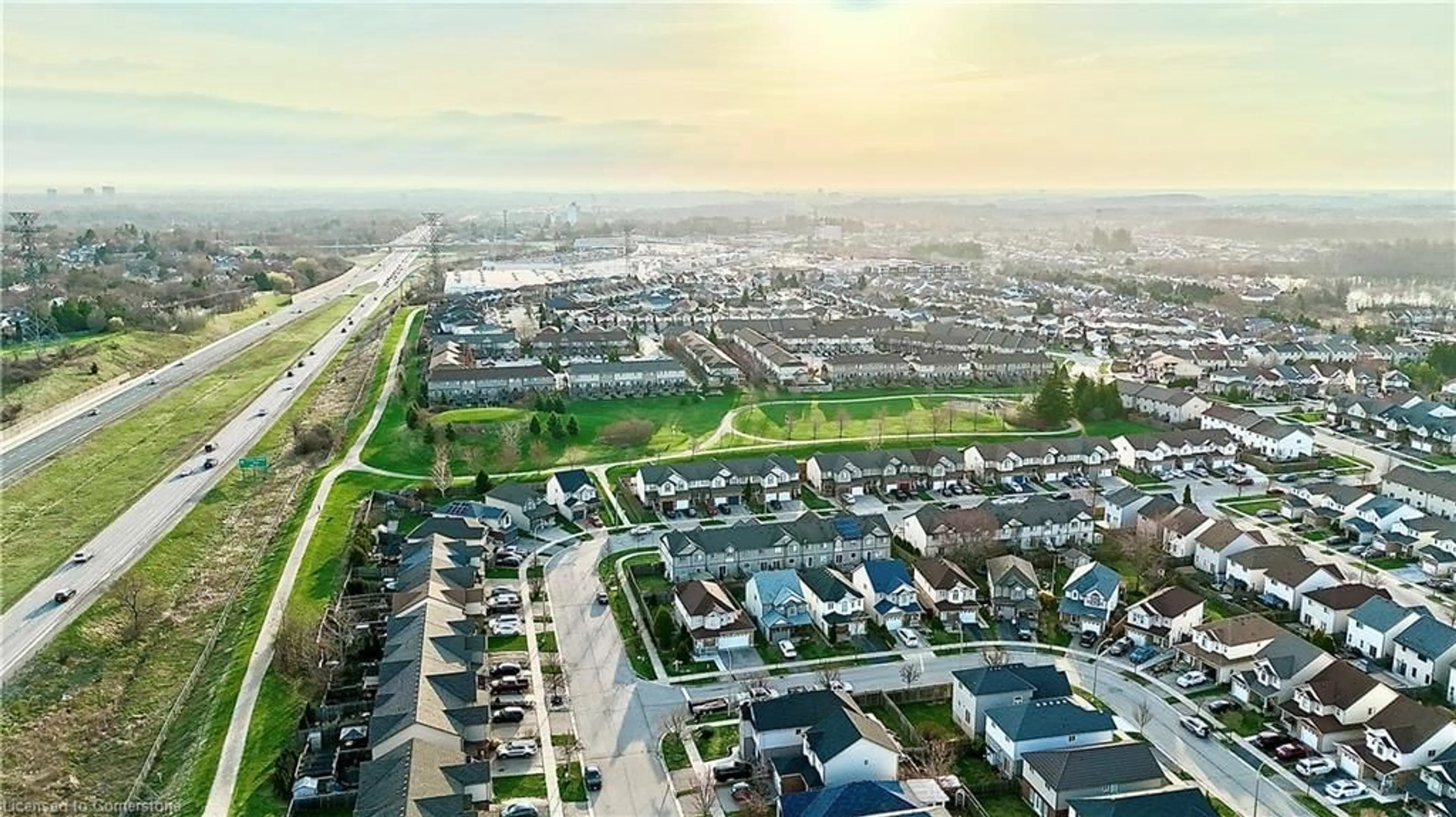 A pic from outside/outdoor area/front of a property/back of a property/a pic from drone, street for 95 Indigo St, Kitchener Ontario N2E 4E5