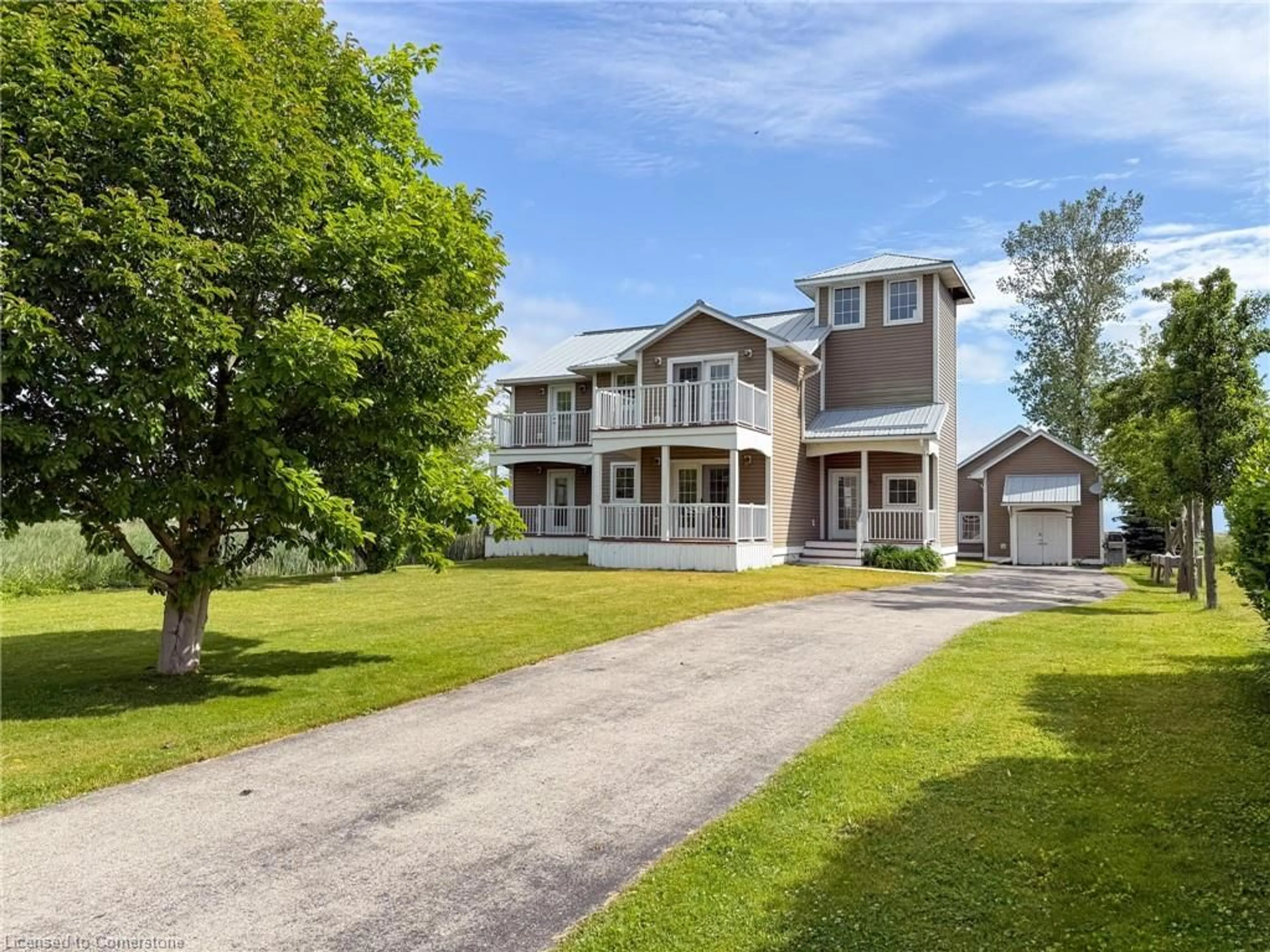 A pic from outside/outdoor area/front of a property/back of a property/a pic from drone, street for 63 Old Cut Blvd, Long Point Ontario N0E 1M0