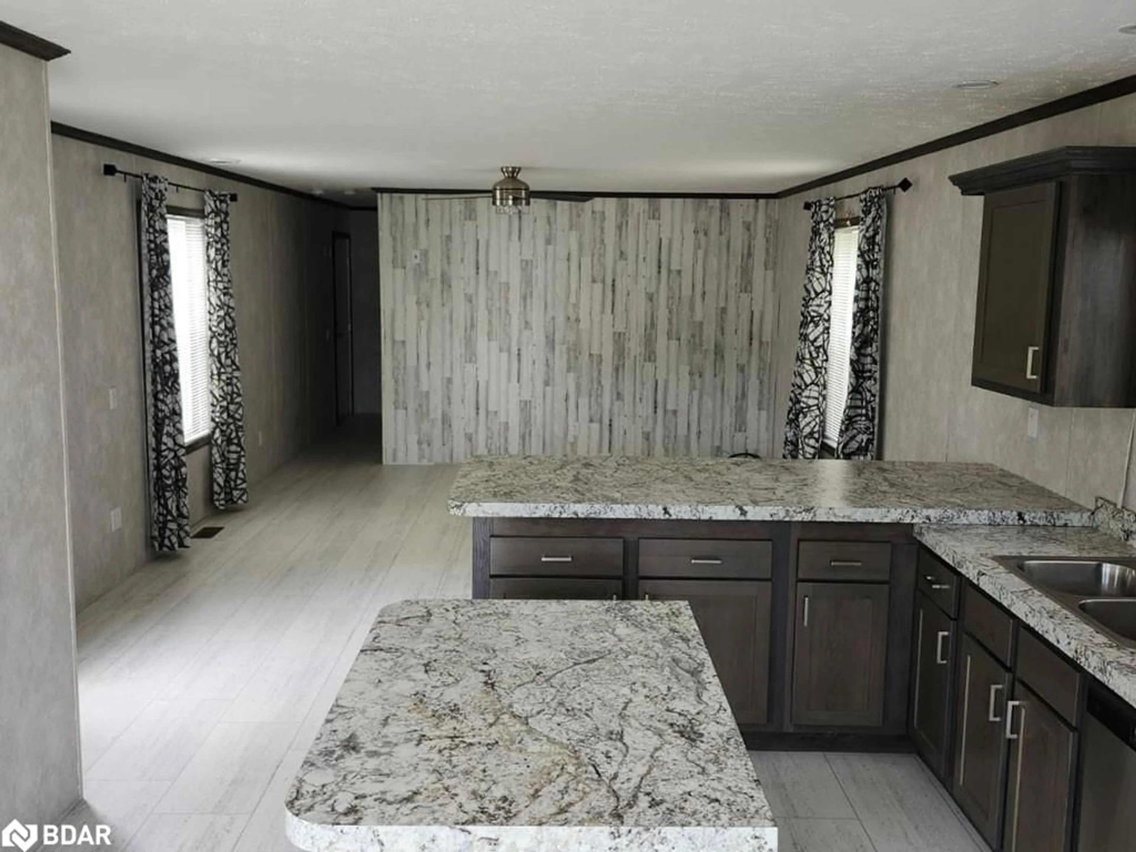 Open concept kitchen, ceramic/tile floor for 45 Tower Rd #4, MacTier Ontario P0C 1H0