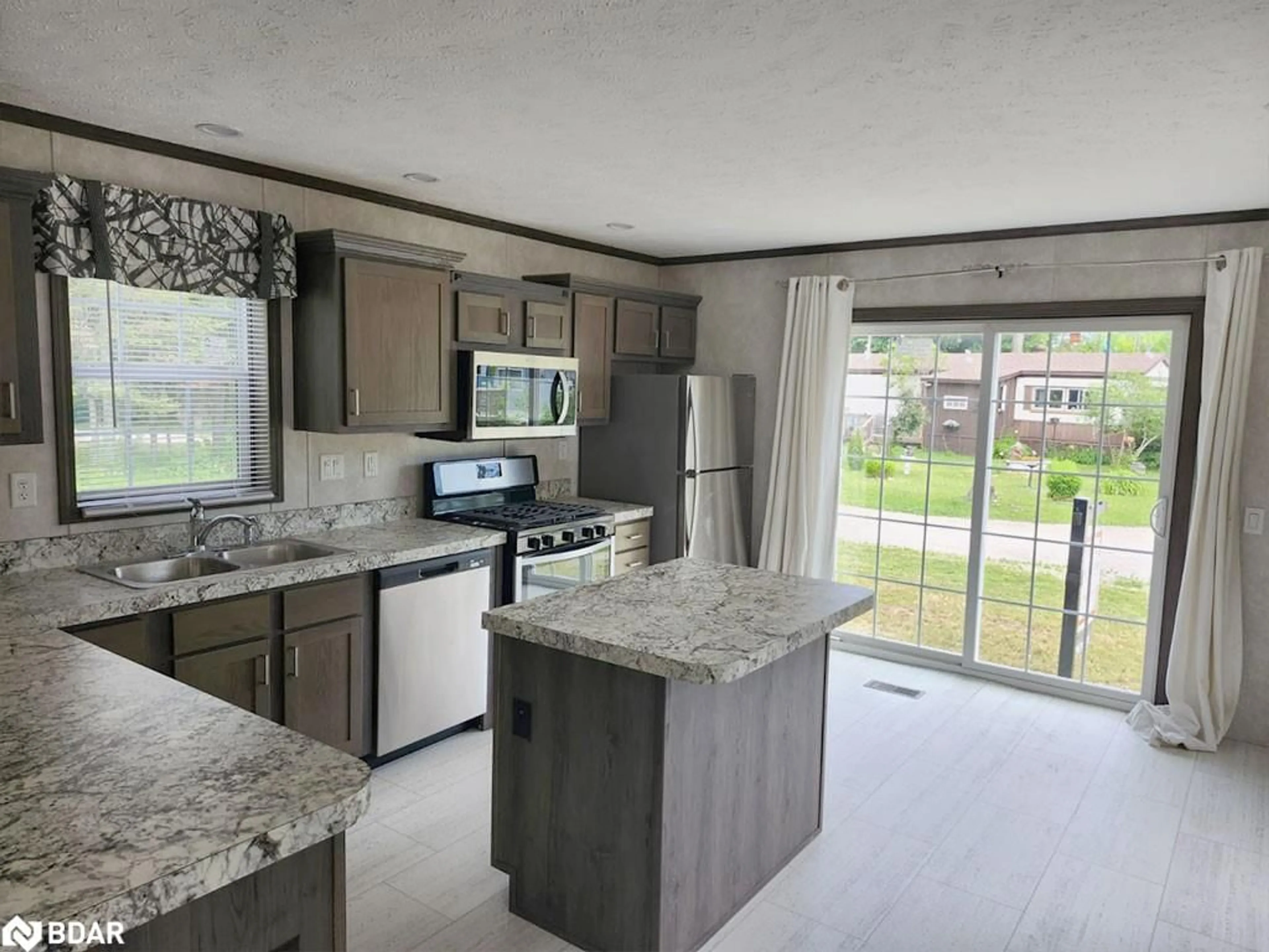 Open concept kitchen, ceramic/tile floor for 45 Tower Rd #4, MacTier Ontario P0C 1H0