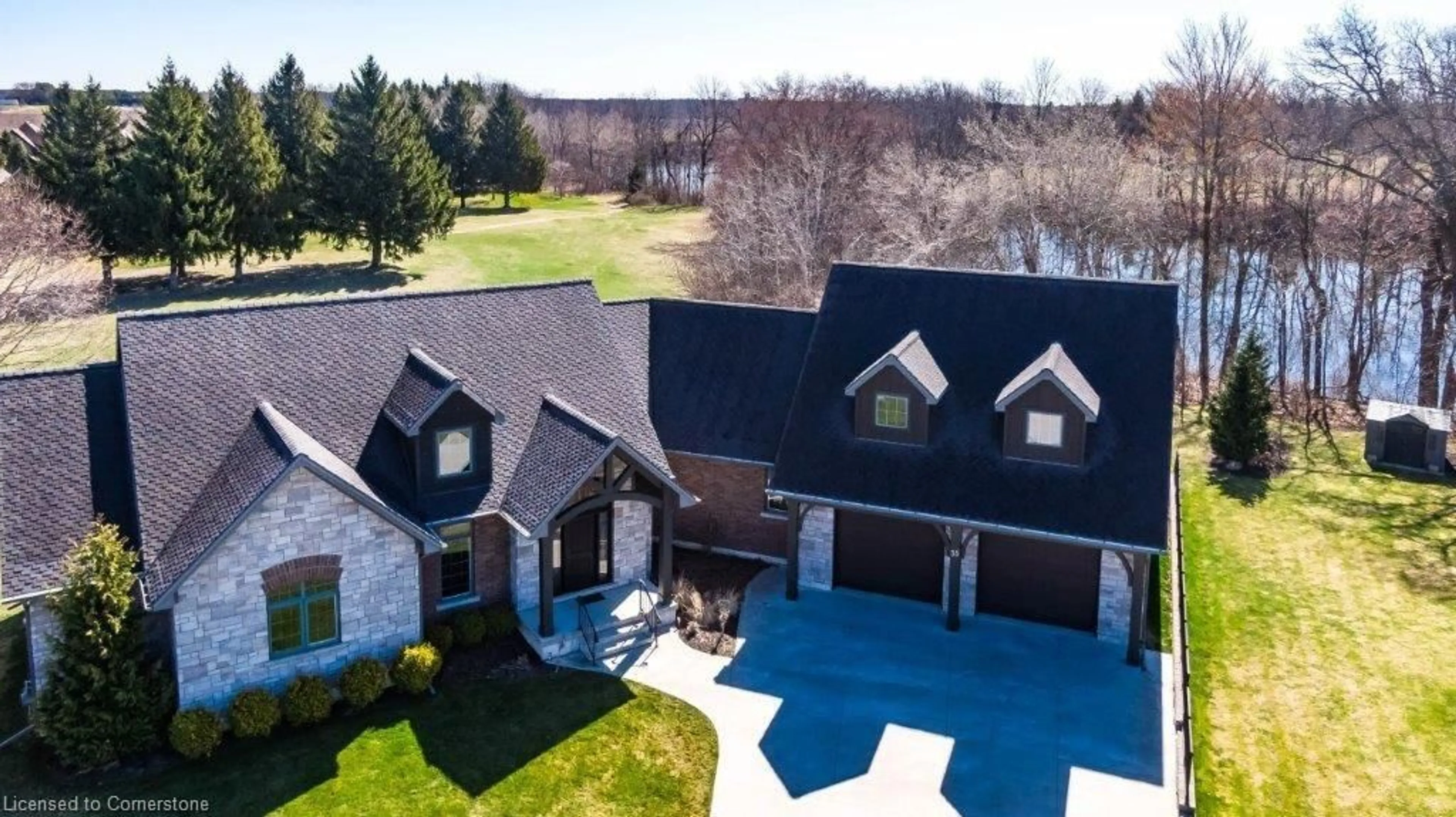 A pic from outside/outdoor area/front of a property/back of a property/a pic from drone, water/lake/river/ocean view for 35 Viola Crt, Delhi Ontario N4B 3C9