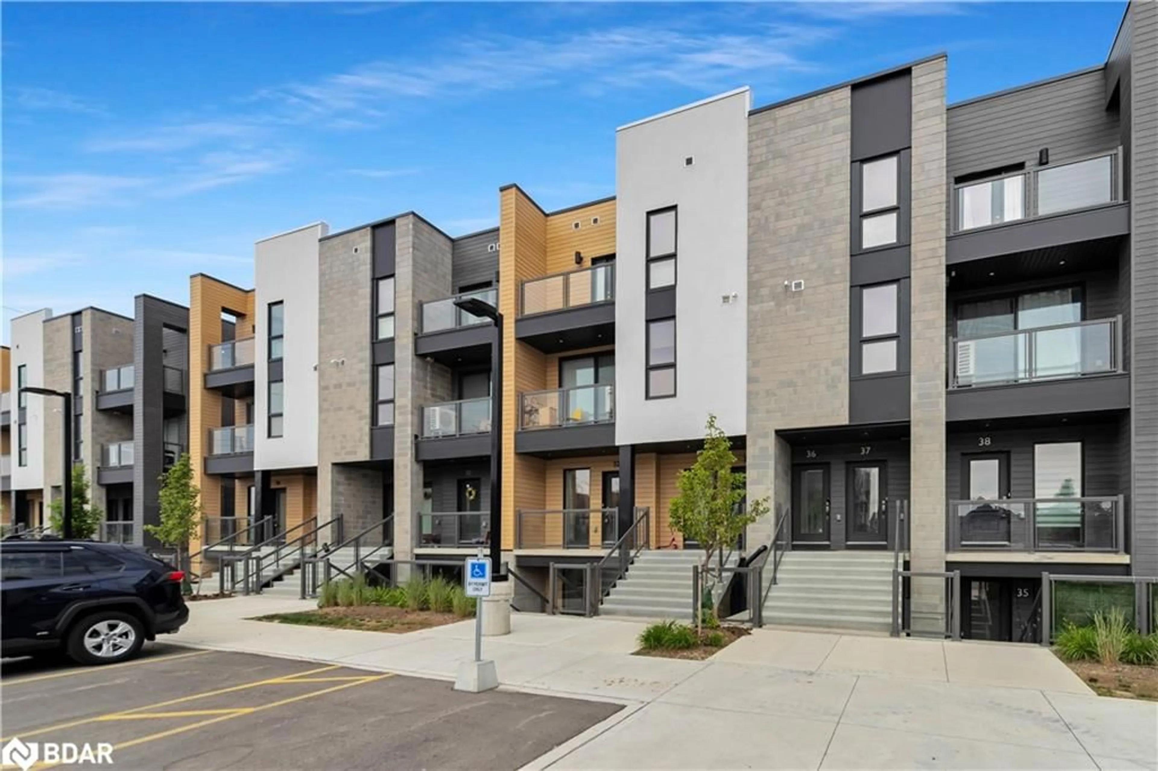 A pic from outside/outdoor area/front of a property/back of a property/a pic from drone, street for 261 Woodbine Ave #32, Kitchener Ontario N4V 0C8