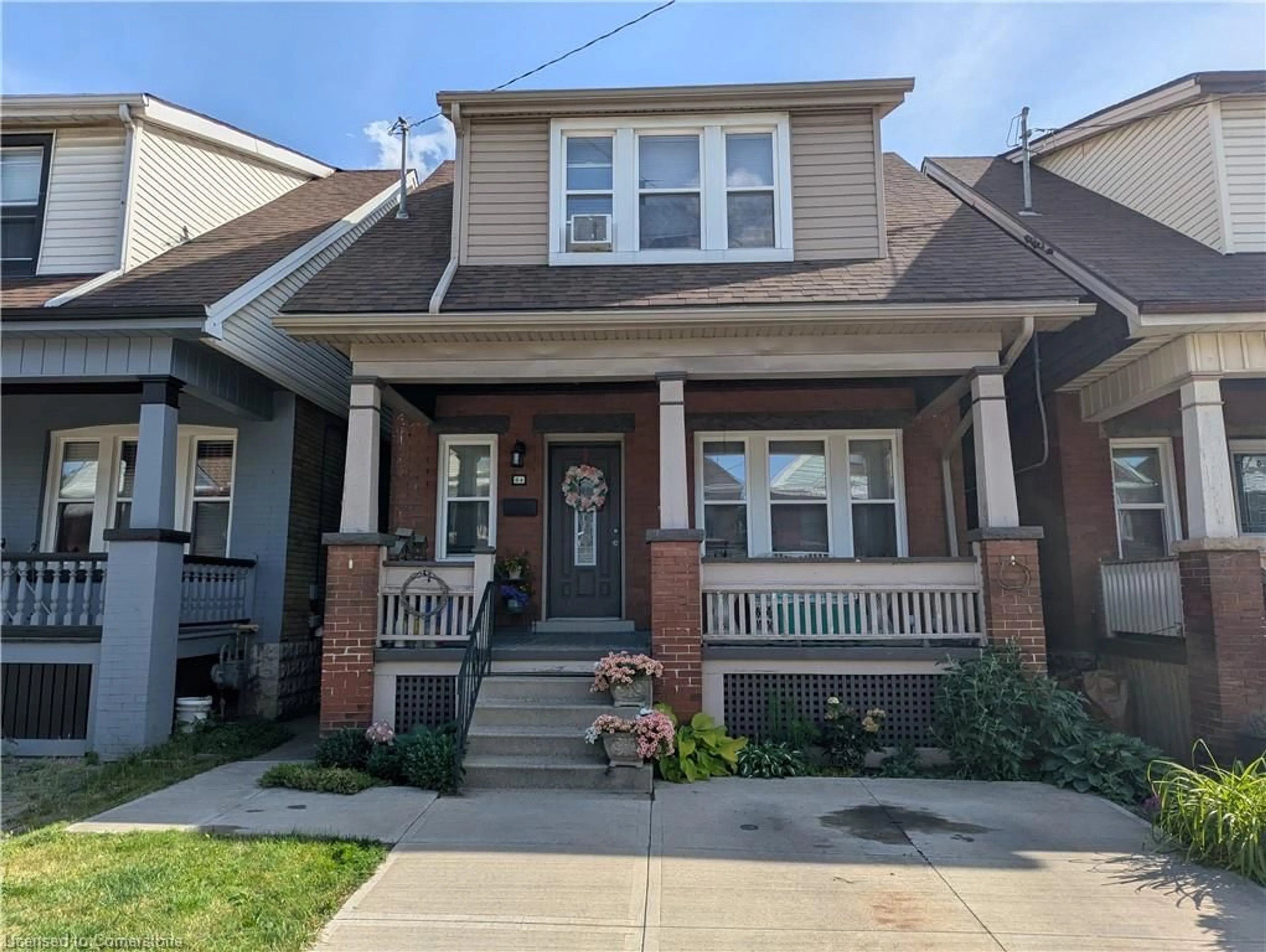 Home with brick exterior material, street for 84 Somerset Ave, Hamilton Ontario L8L 2L7