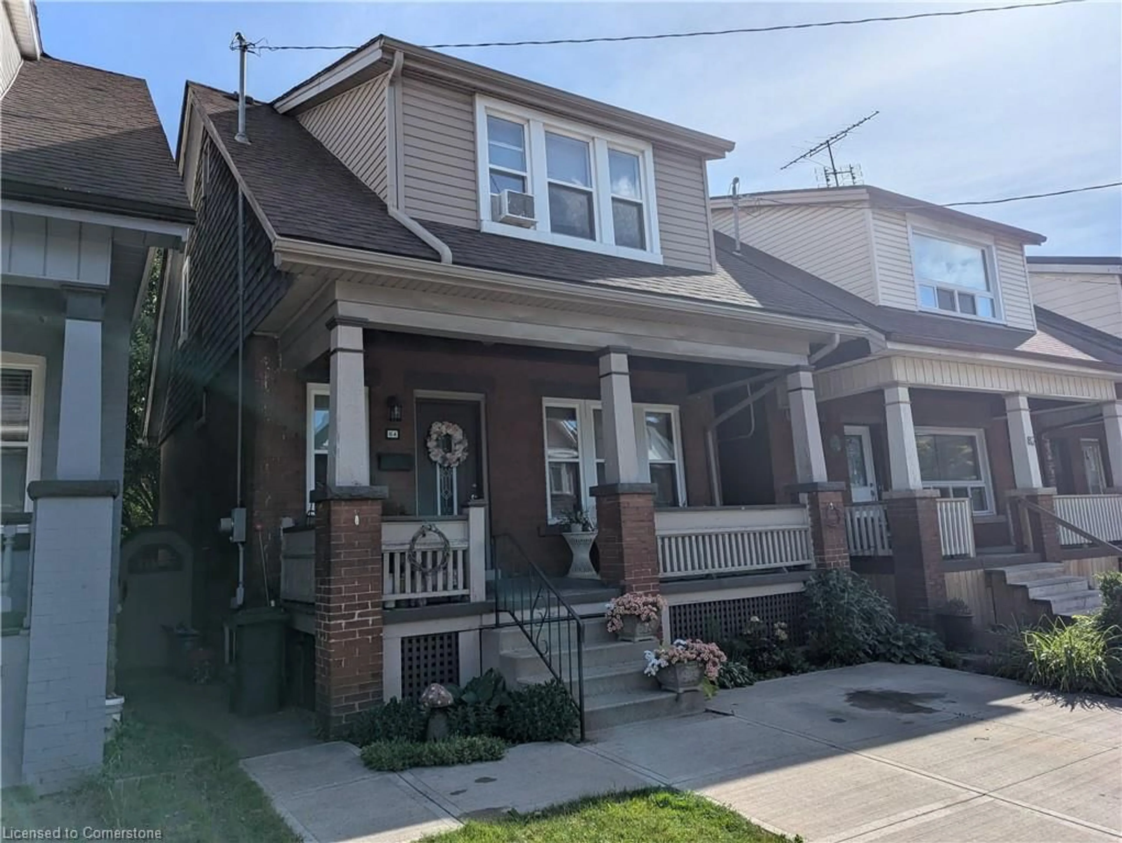 Home with brick exterior material, street for 84 Somerset Ave, Hamilton Ontario L8L 2L7
