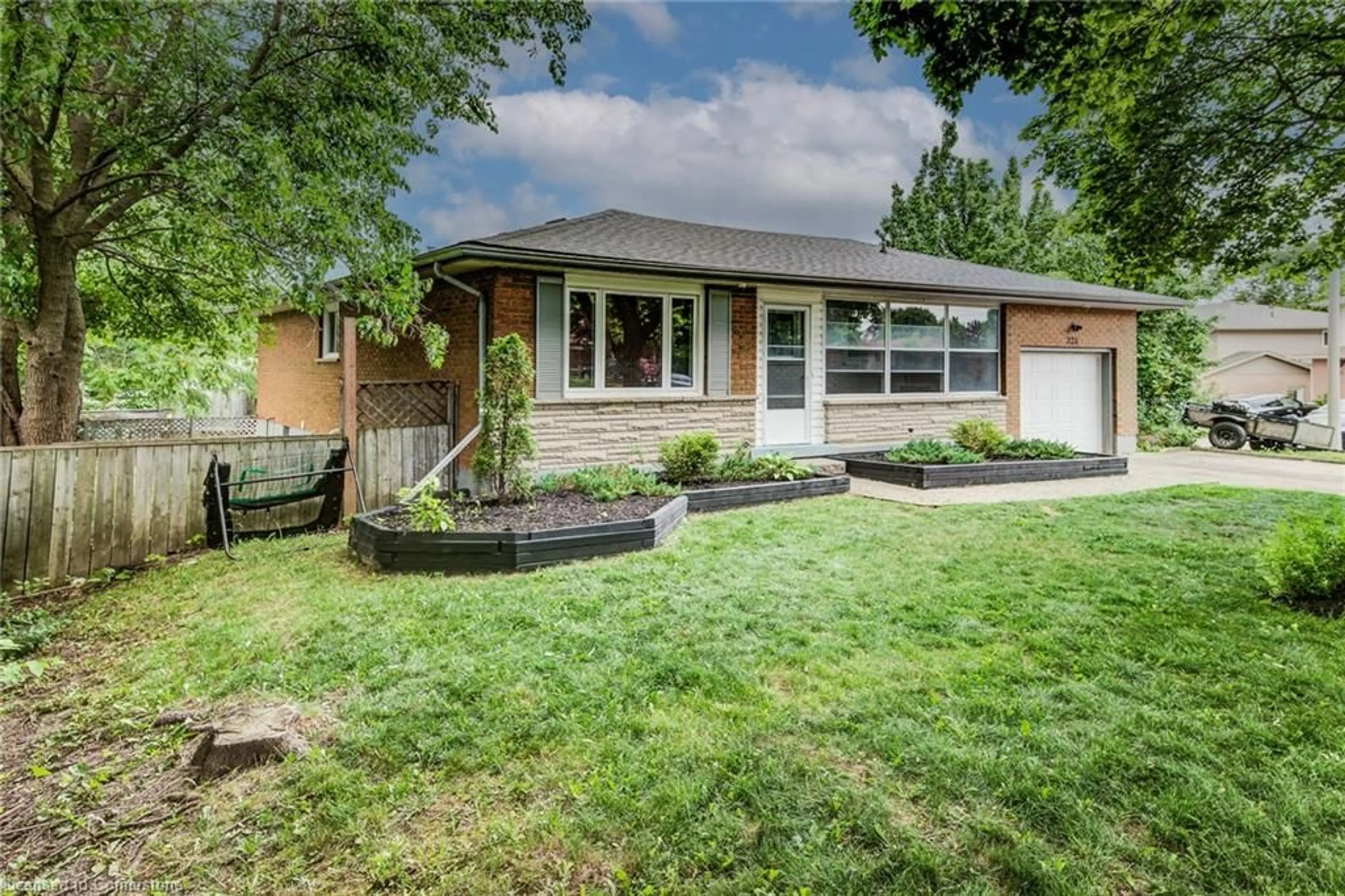 Home with brick exterior material, street for 223 Williamsburg Rd, Kitchener Ontario N2E 1K8