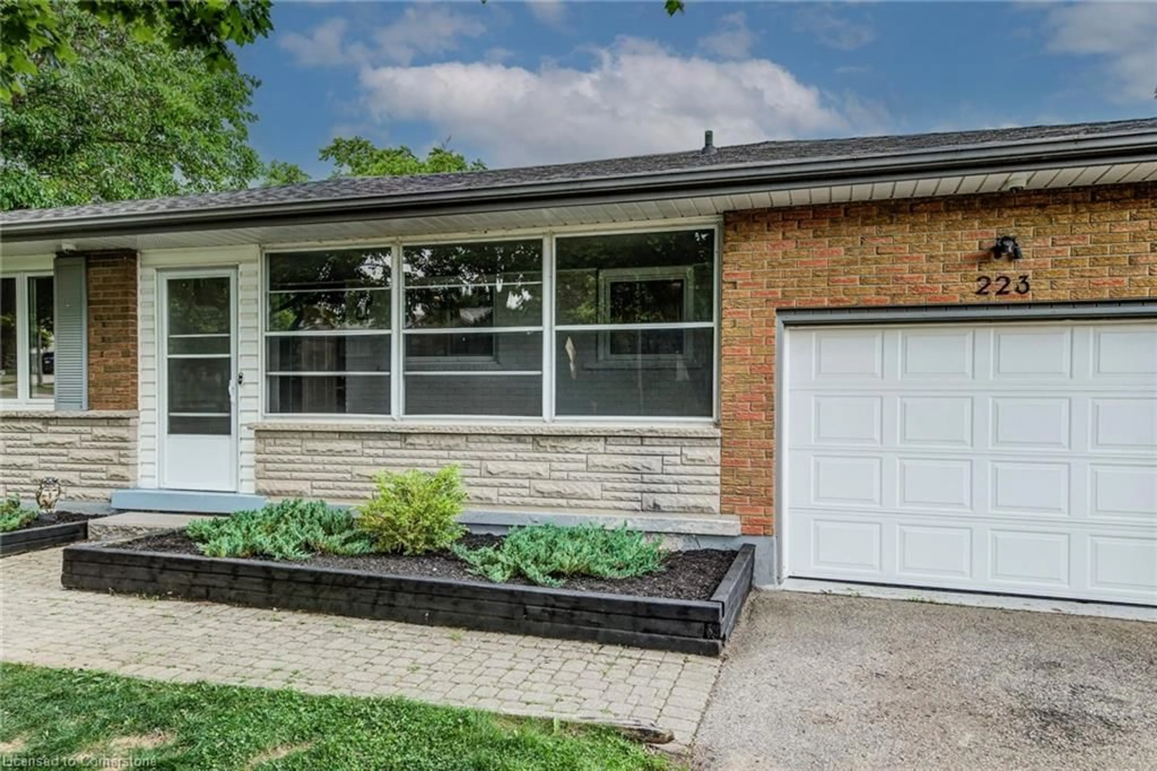 Home with brick exterior material, street for 223 Williamsburg Rd, Kitchener Ontario N2E 1K8