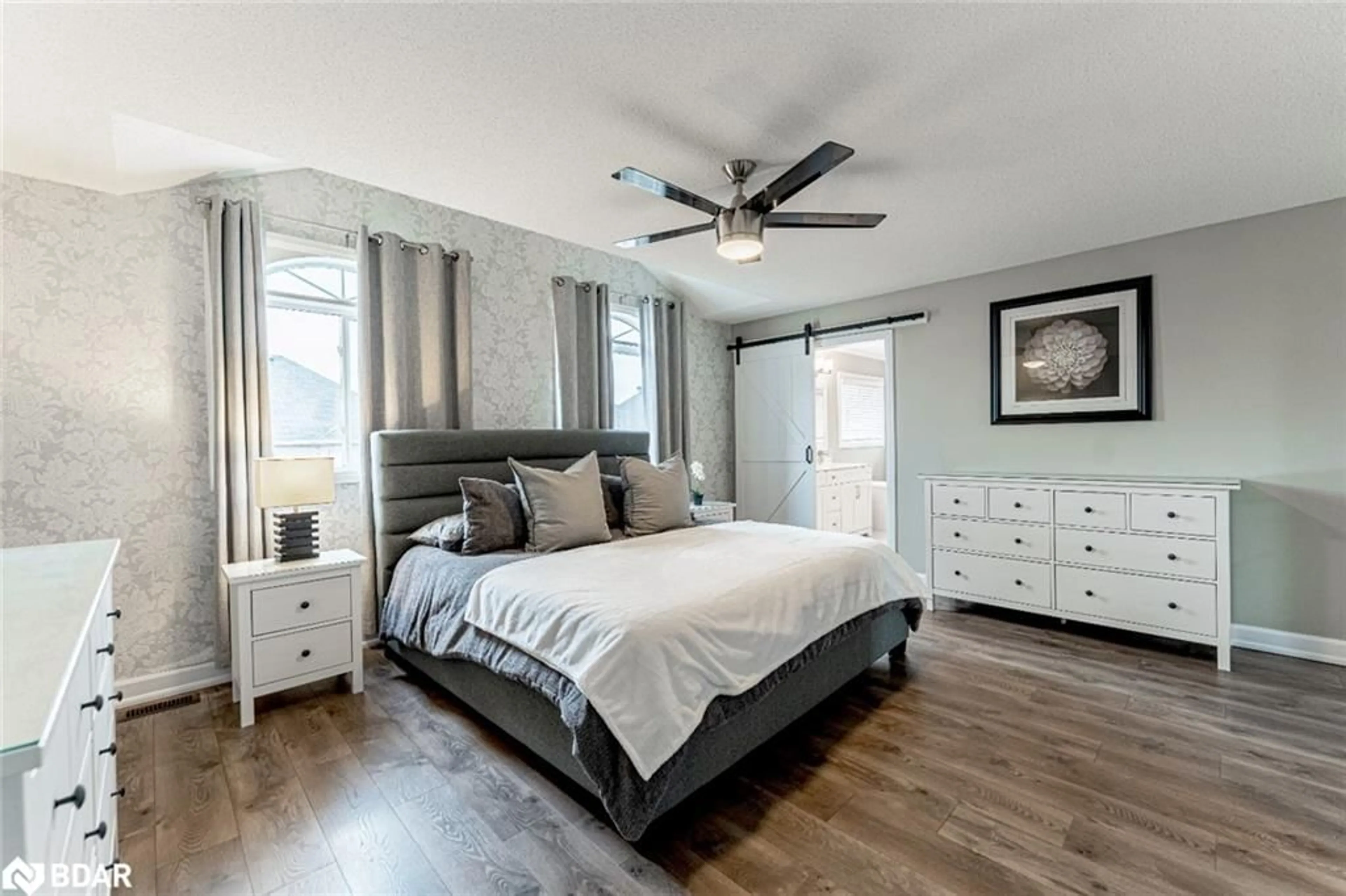 Bedroom with bed, wood/laminate floor for 44 Tudor Cres, Barrie Ontario L4M 0A8
