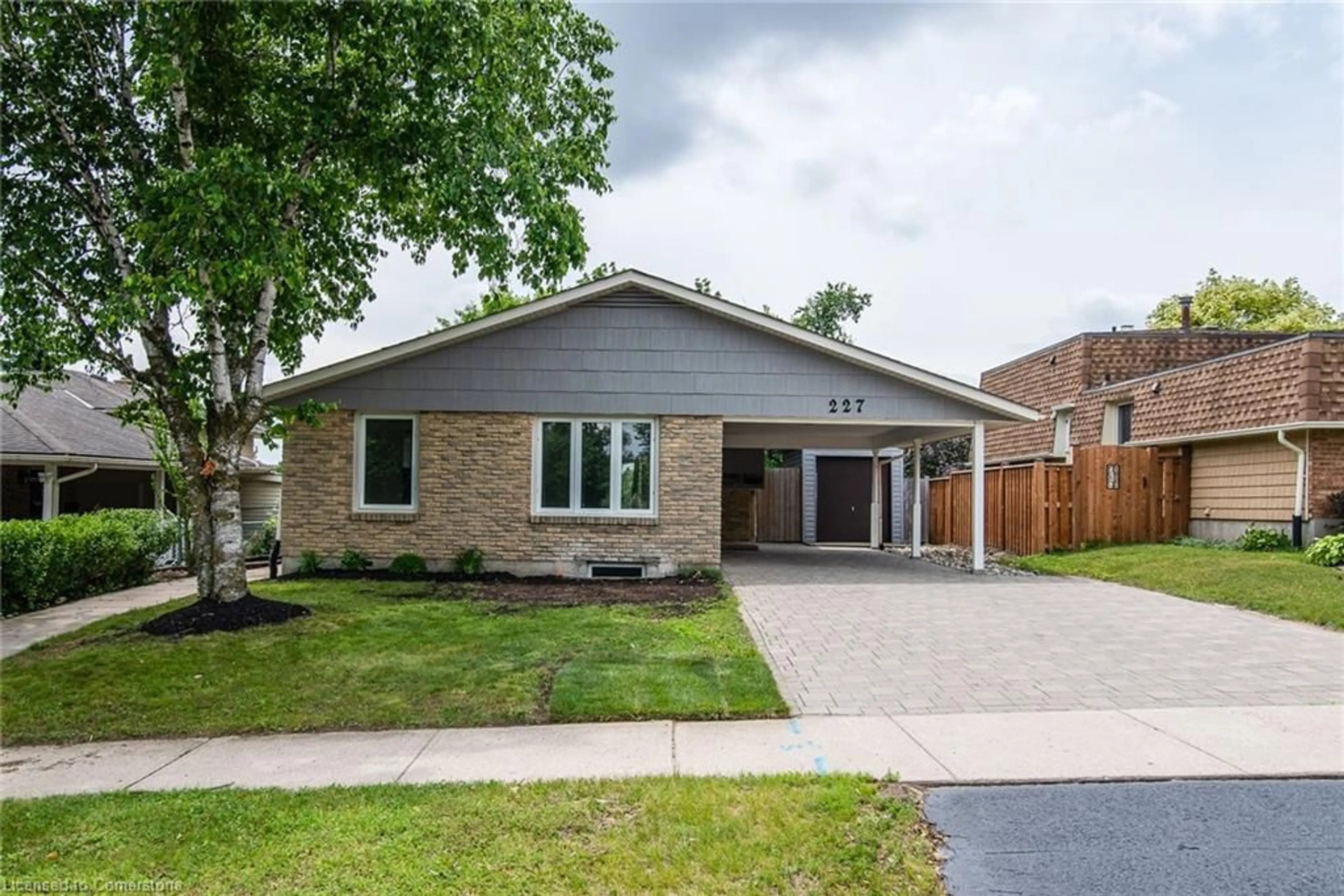 Home with brick exterior material, street for 227 Blackhorne Dr, Kitchener Ontario N2E 1Z2