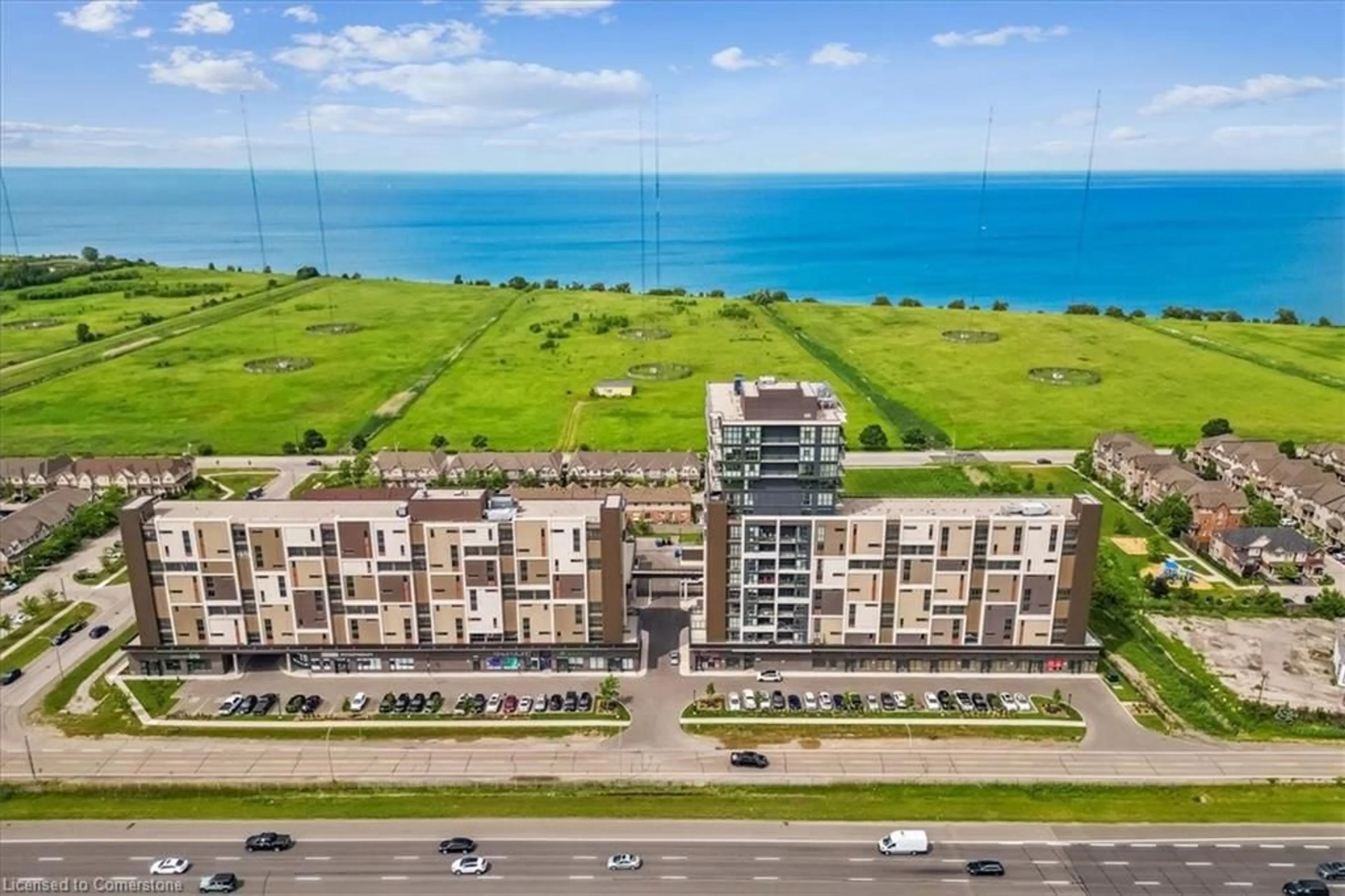 A pic from outside/outdoor area/front of a property/back of a property/a pic from drone, water/lake/river/ocean view for 550 North Service Rd #806, Grimsby Ontario L3M 0H9