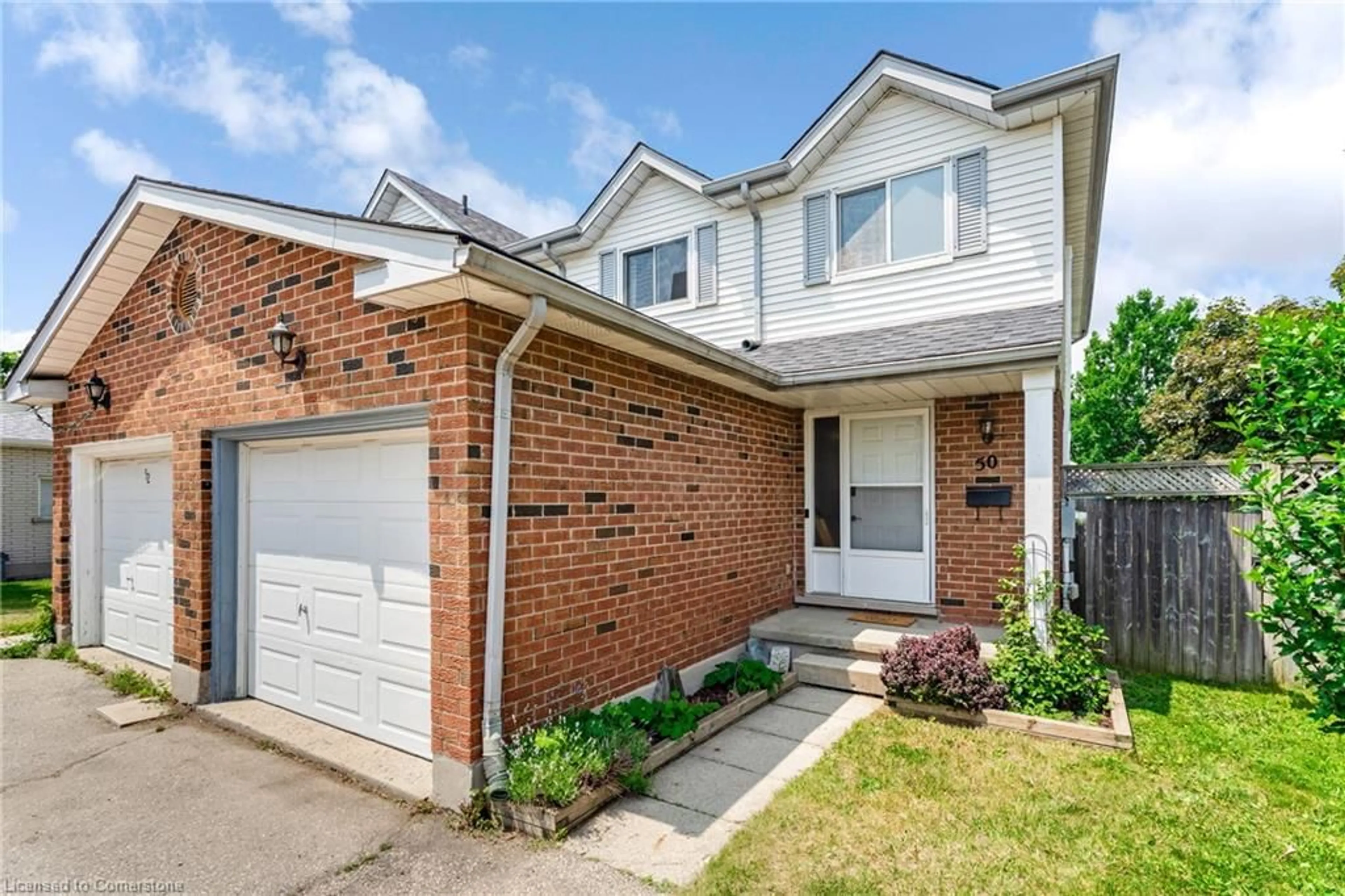 Home with brick exterior material, street for 50 Highland Cres, Kitchener Ontario N2M 5C1